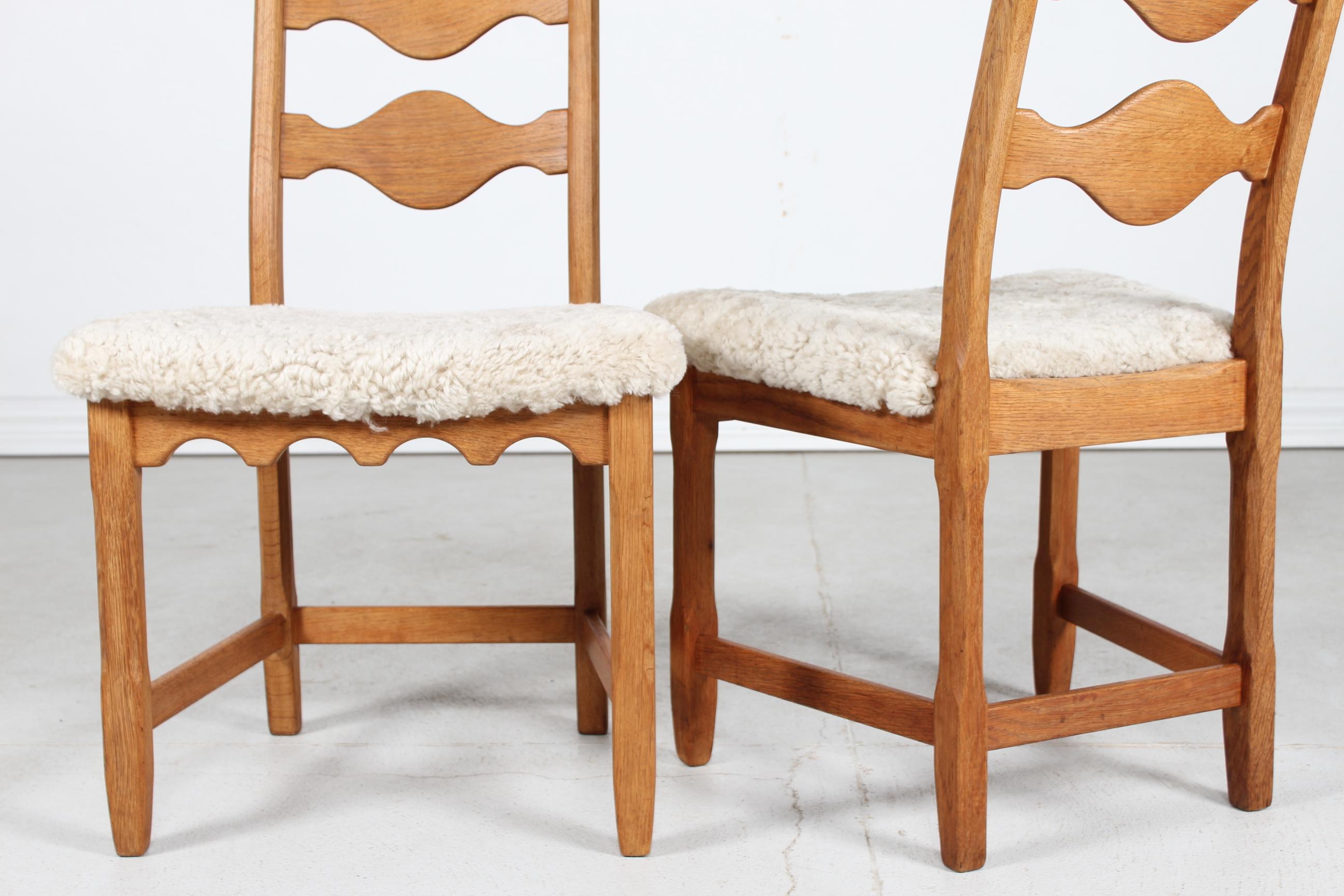 Set of 2 Danish Henning Kjærnulf Chairs of Solid Oak with Sheepskin, 1970s 2