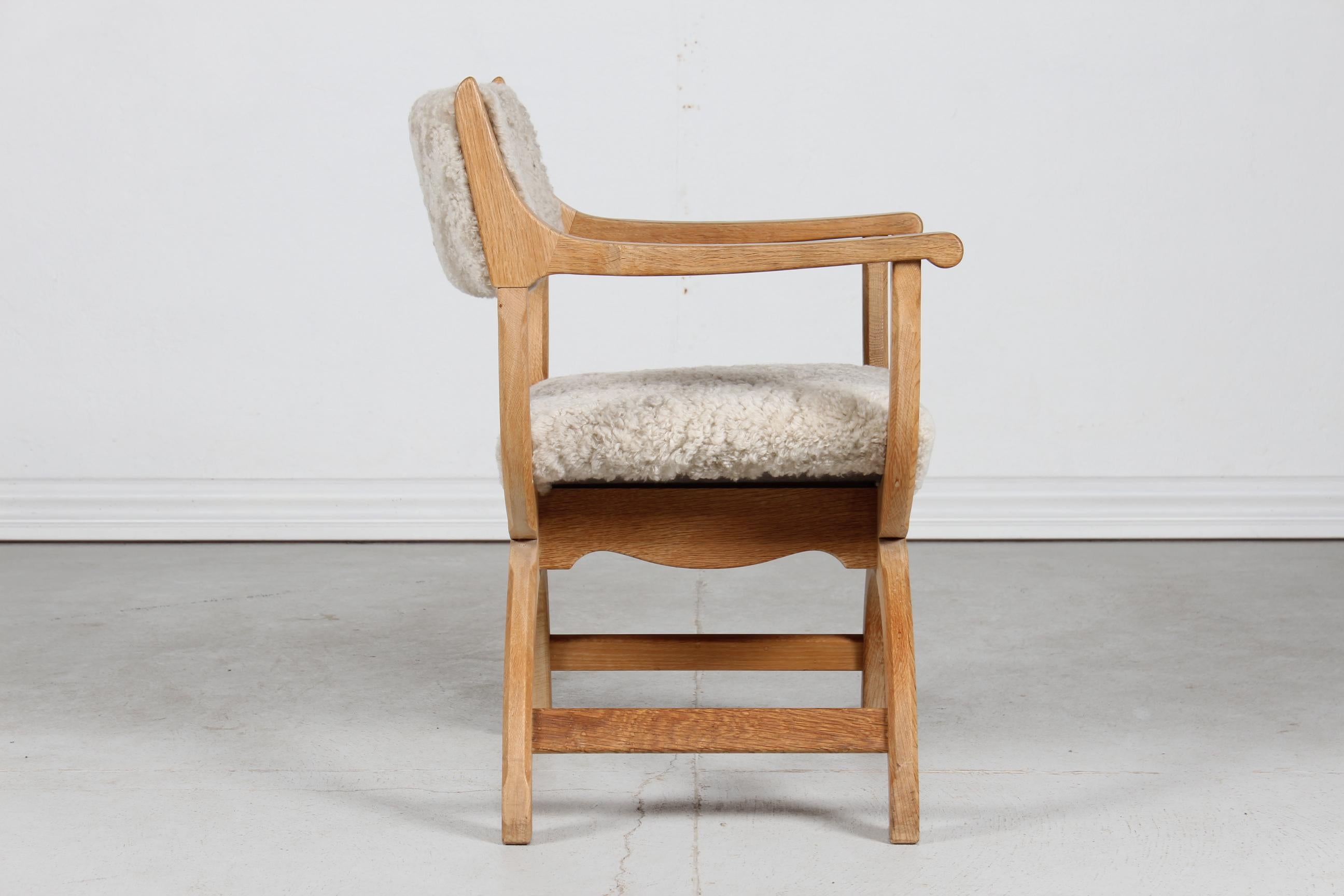 Mid-Century Modern Danish Henning Kjærnulf Kurul Chair by EG Møbler of Solid Oak + Sheep Skin 1970