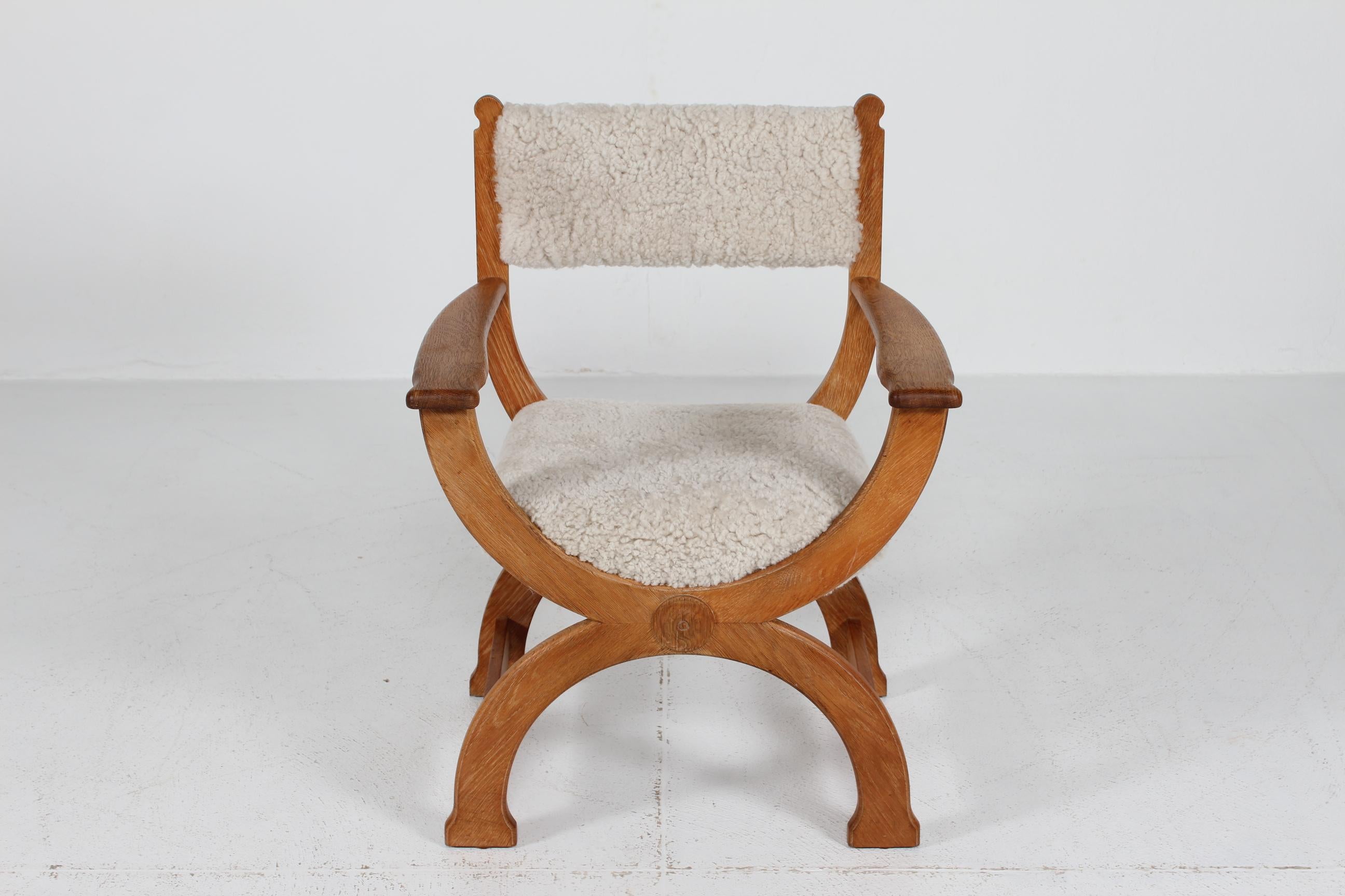 Mid-Century Modern Danish Henning Kjærnulf Kurul Chair by EG Møbler of Solid Oak + Sheep Skin 1970s For Sale