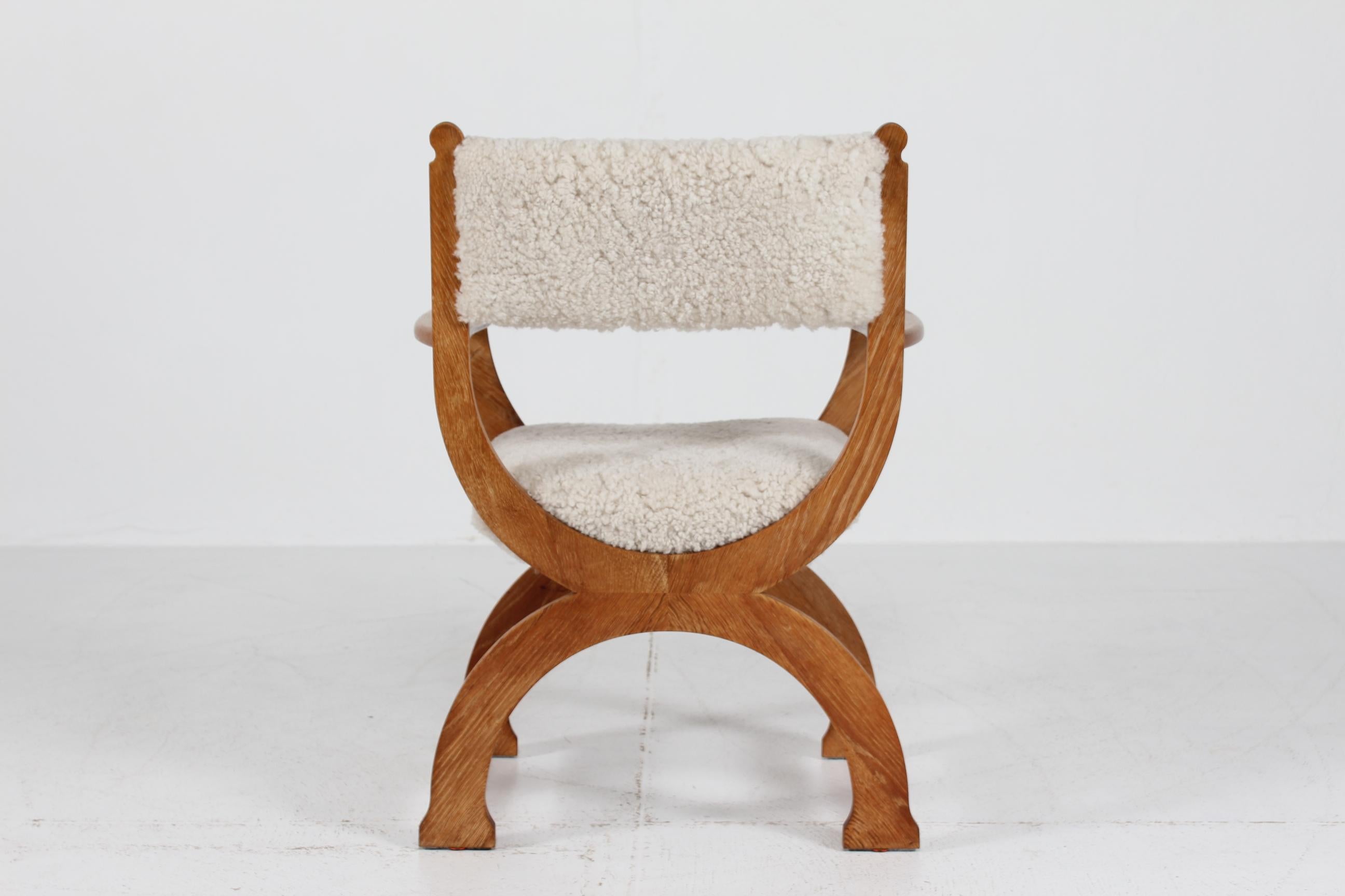 Danish Henning Kjærnulf Kurul Chair by EG Møbler of Solid Oak + Sheep Skin 1970s In Good Condition For Sale In Silkeborg, Silkeborg