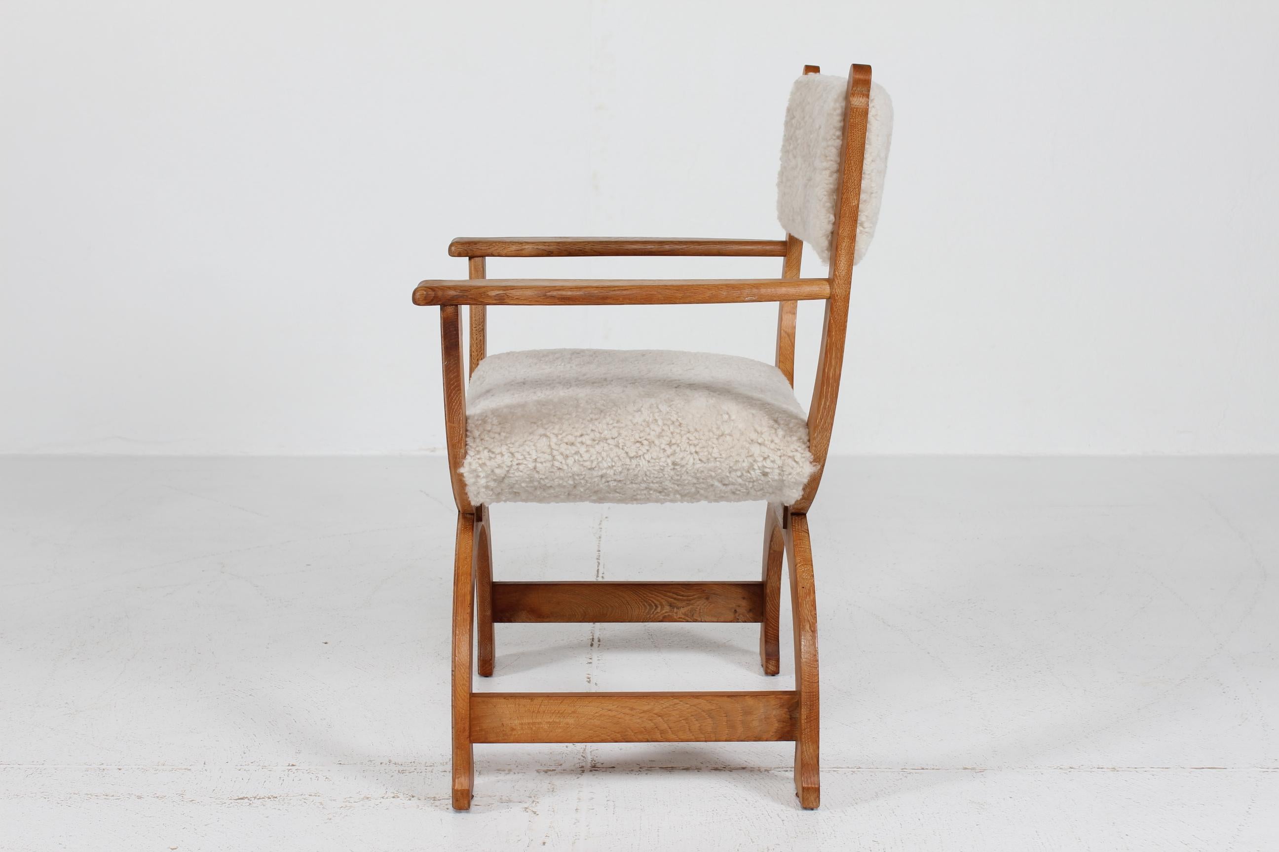 Sheepskin Danish Henning Kjærnulf Kurul Chair by EG Møbler of Solid Oak + Sheep Skin 1970s For Sale