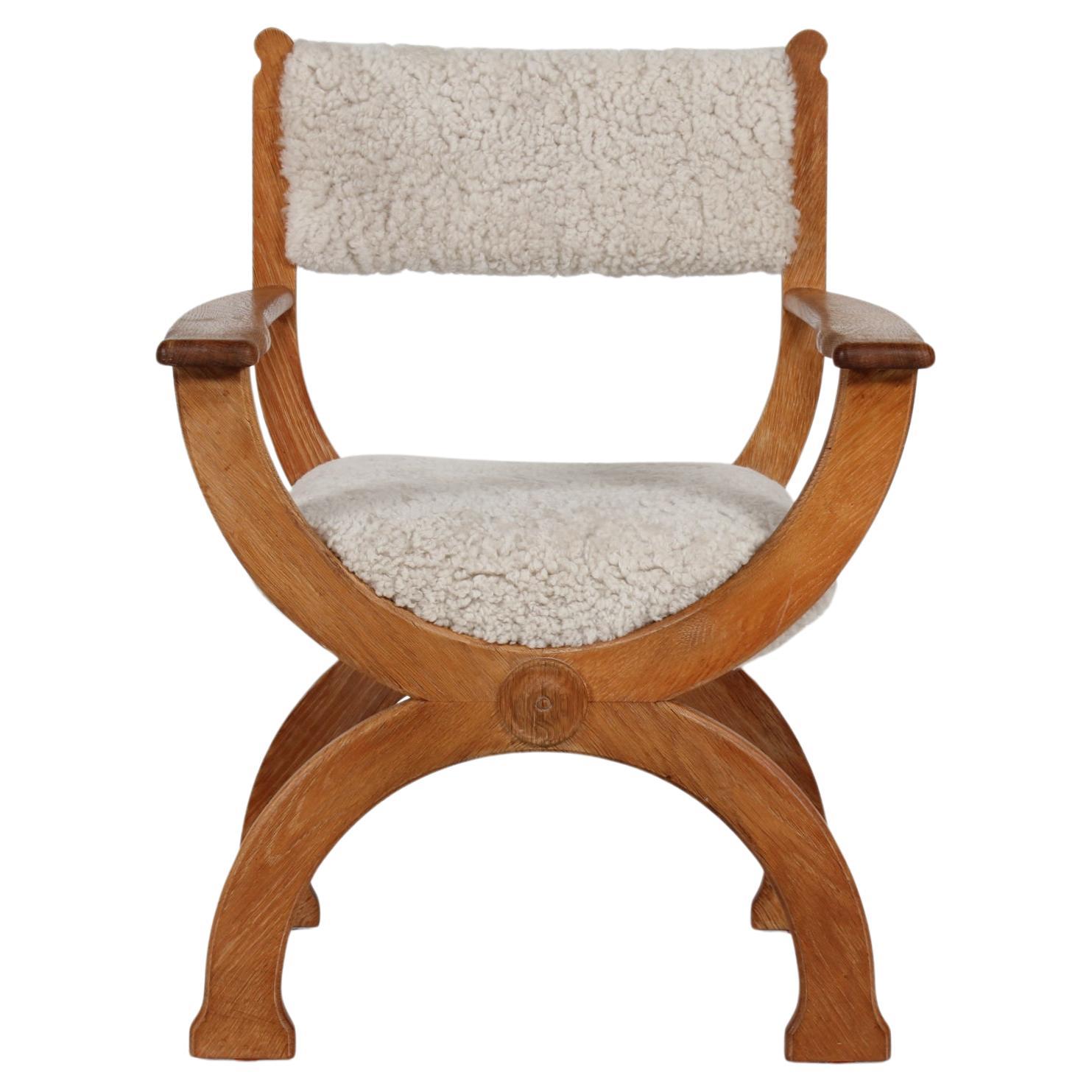 Danish Henning Kjærnulf Kurul Chair by EG Møbler of Solid Oak + Sheep Skin 1970s For Sale