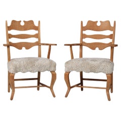 Danish Henning Kjærnulf Pair Razor Blade Armchairs of Solid Oak with Sheep Skin