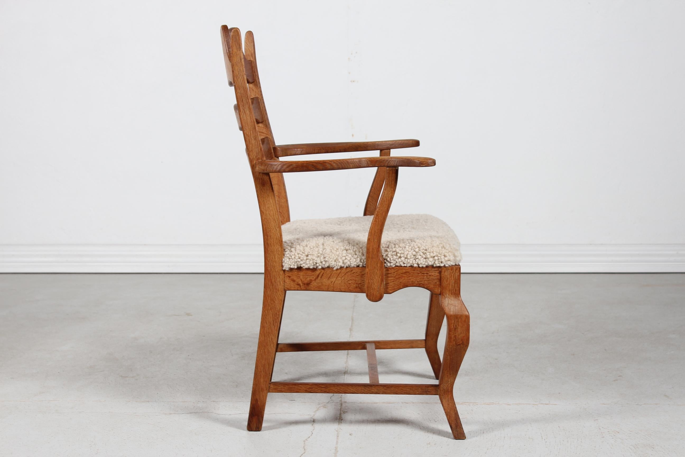 Mid-Century Modern Danish Henning Kjærnulf Razor Blade Armchair of Solid Oak with New Sheep Skin For Sale