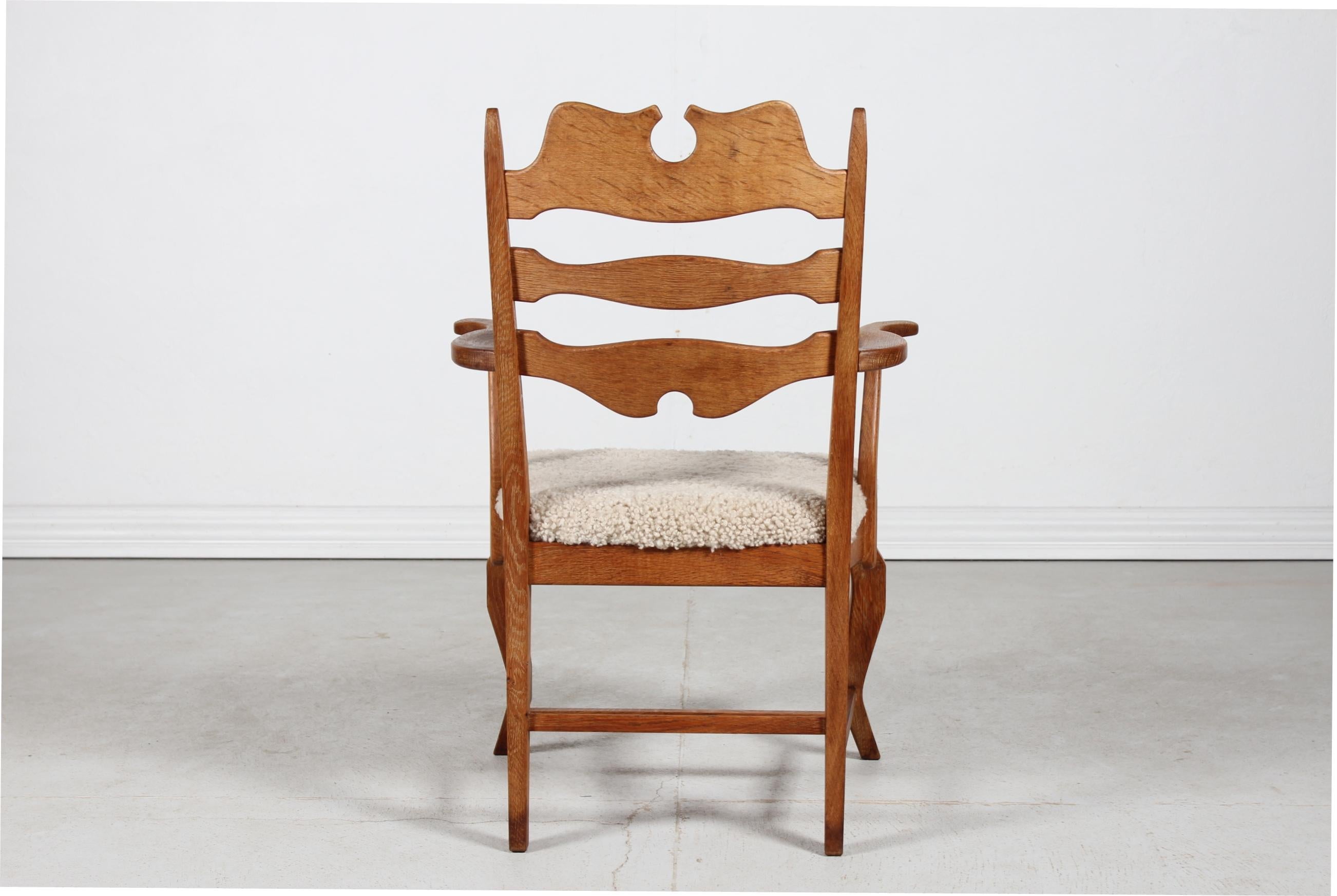 Woodwork Danish Henning Kjærnulf Razor Blade Armchair of Solid Oak with New Sheep Skin For Sale