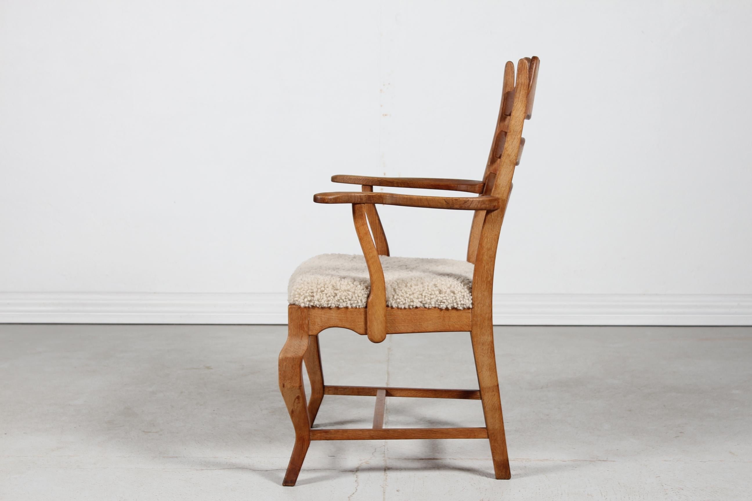 Danish Henning Kjærnulf Razor Blade Armchair of Solid Oak with New Sheep Skin In Good Condition For Sale In Silkeborg, Silkeborg