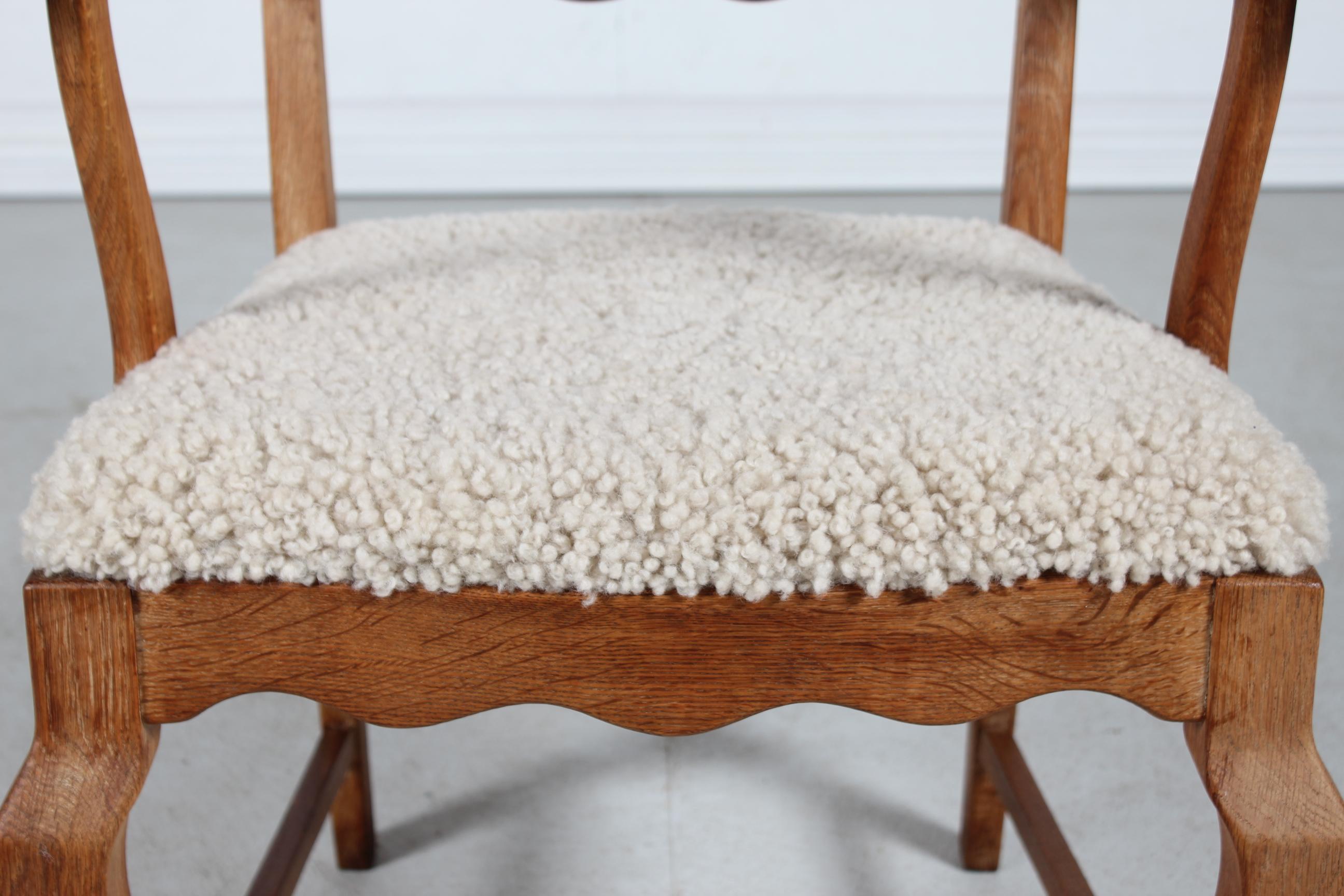 Sheepskin Danish Henning Kjærnulf Razor Blade Armchair of Solid Oak with New Sheep Skin For Sale