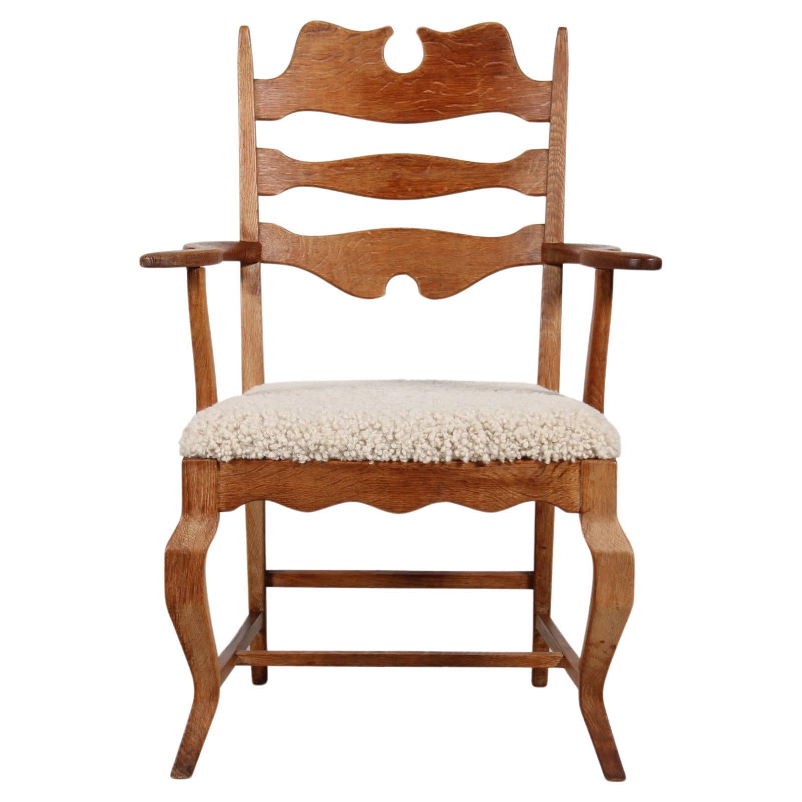 Danish Henning Kjærnulf Razor Blade Armchair of Solid Oak with New Sheep Skin For Sale