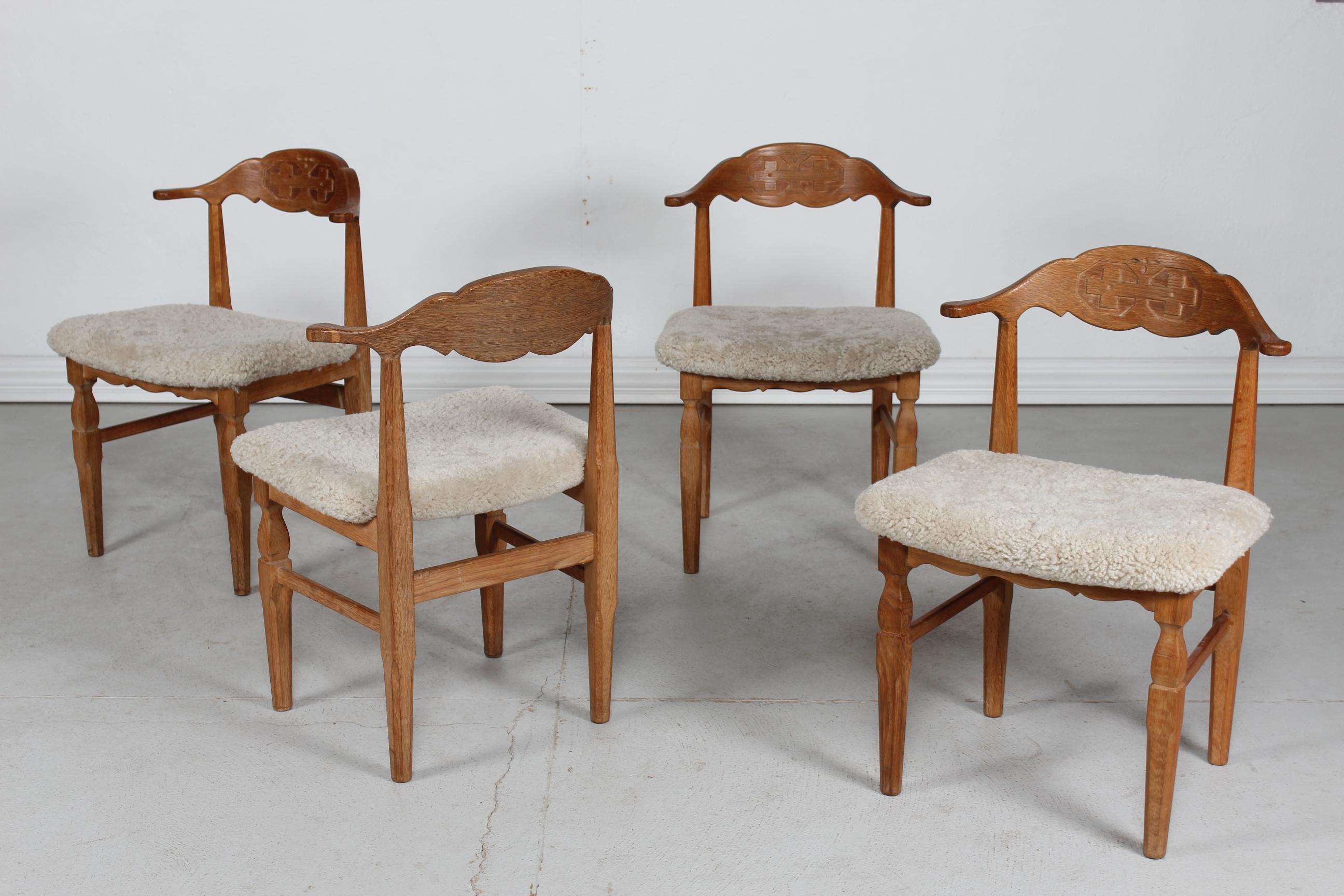 Mid-Century Modern Danish Henning Kjærnulf Set of 4 Dining Chairs of Solid Oak and Sheepskin, 1970s For Sale