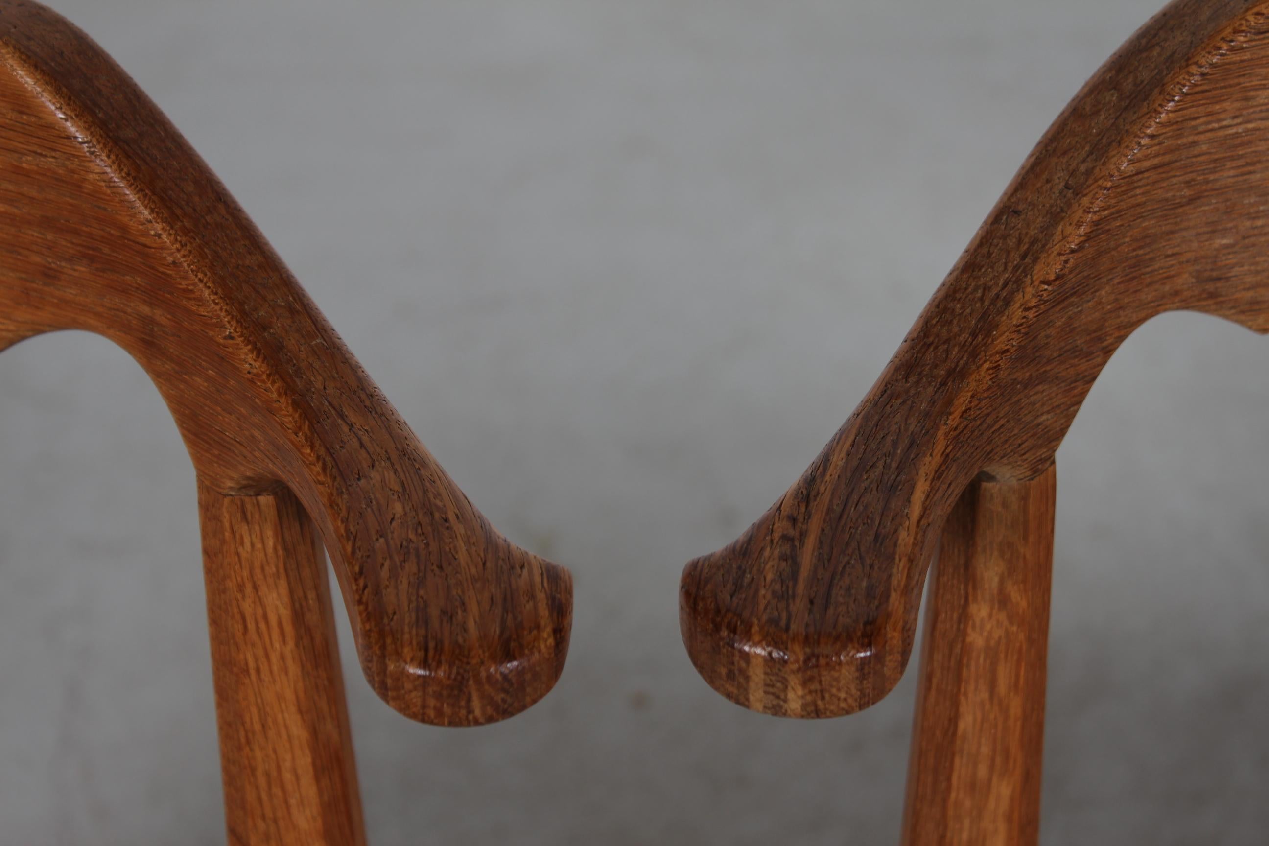 Late 20th Century Danish Henning Kjærnulf Set of 4 Dining Chairs of Solid Oak and Sheepskin, 1970s For Sale