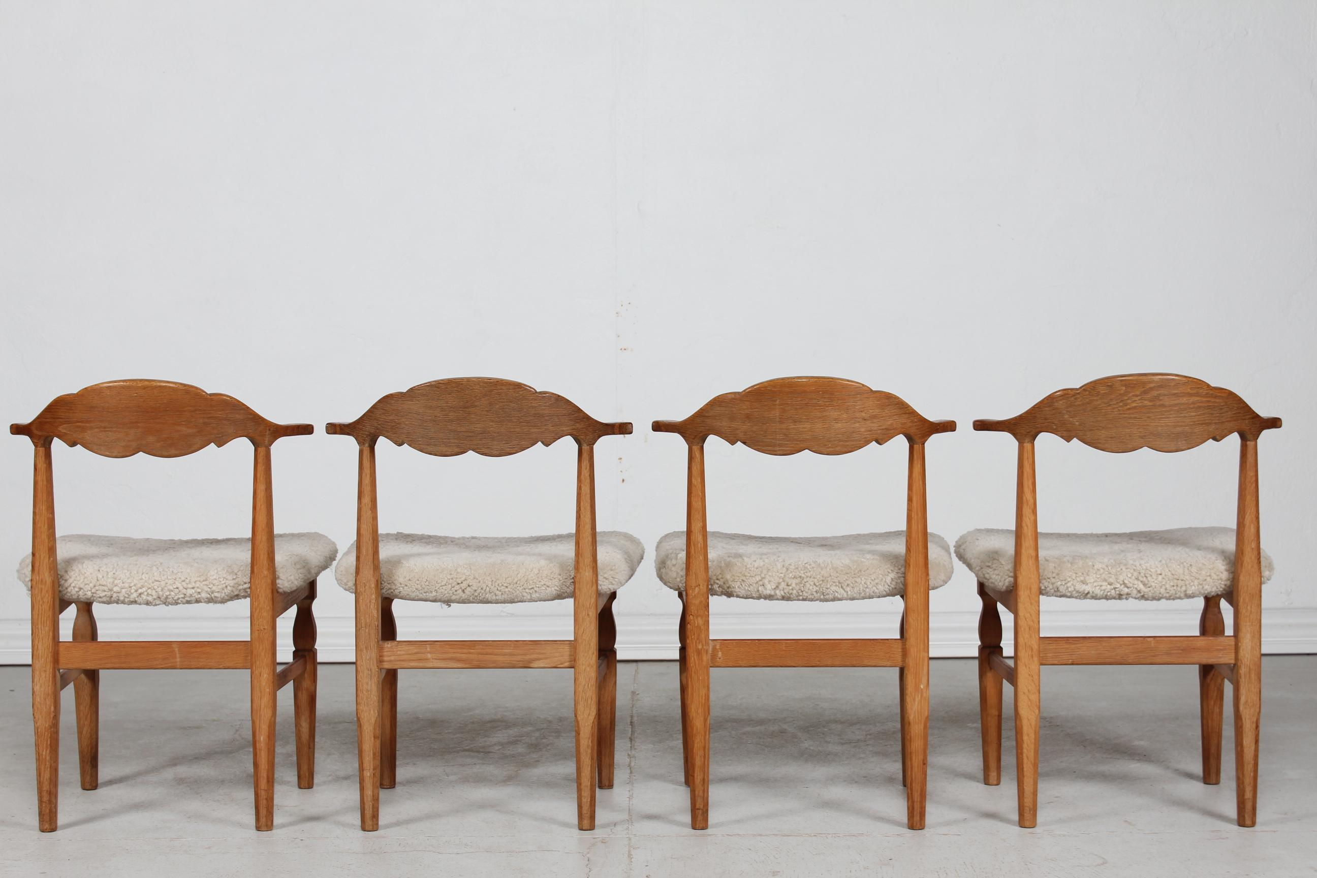 Danish Henning Kjærnulf Set of 4 Dining Chairs of Solid Oak and Sheepskin, 1970s For Sale 1