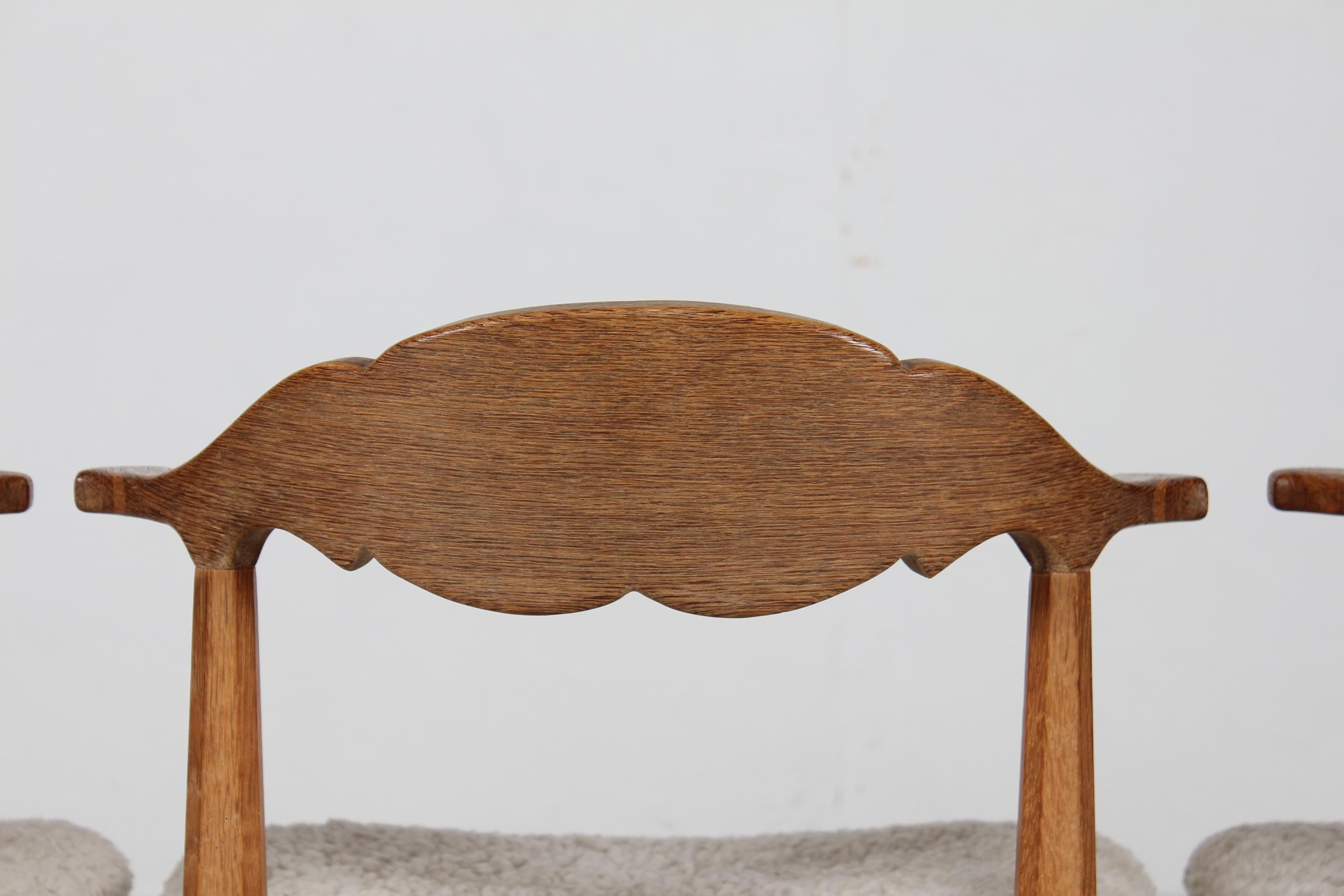 Danish Henning Kjærnulf Set of 4 Dining Chairs of Solid Oak and Sheepskin, 1970s For Sale 2