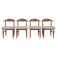 Retro Danish Henning Kjærnulf Set of 4 Dining Chairs of Solid Oak and Sheepskin, 1970s