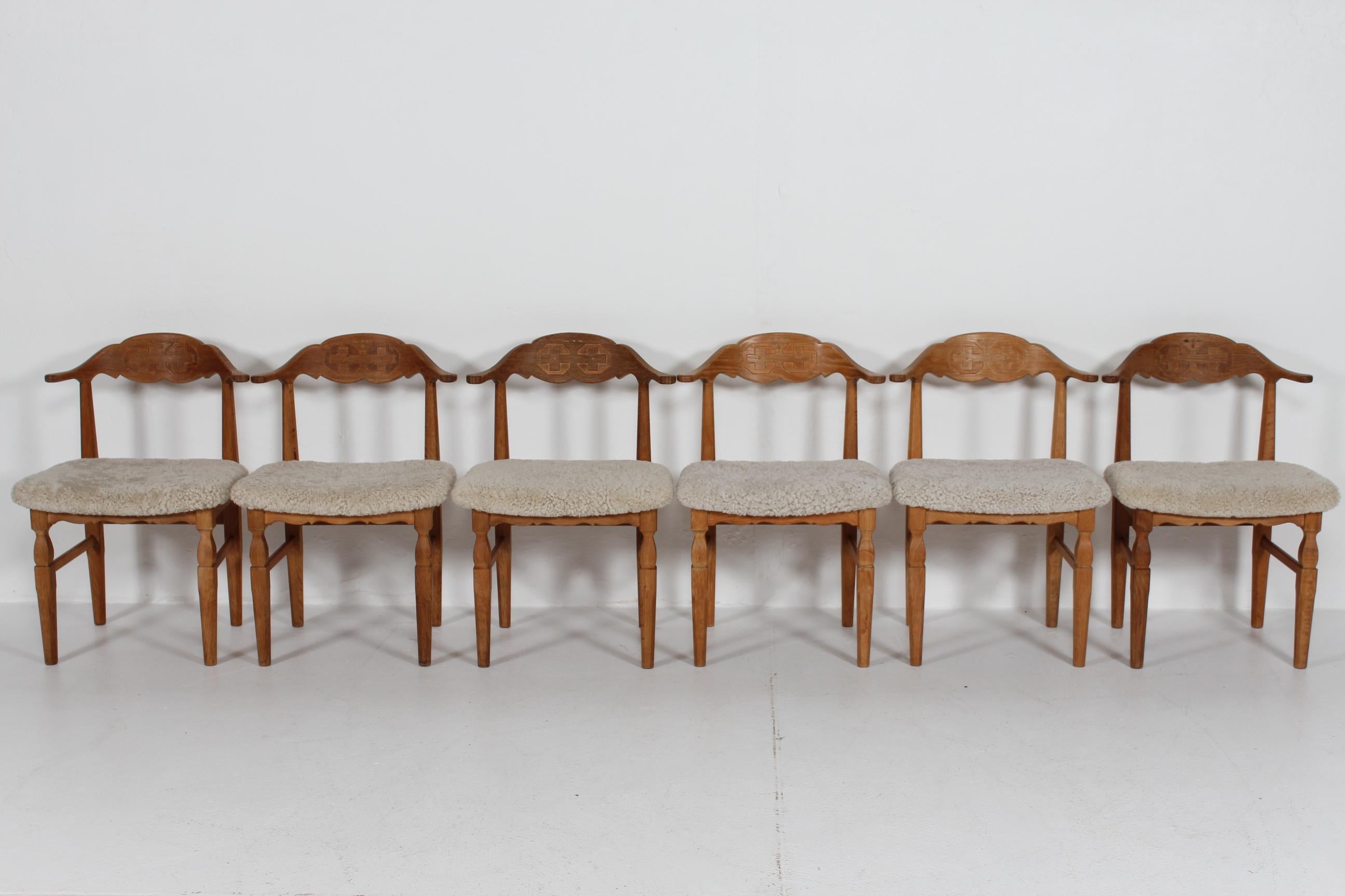 Mid-Century Modern Danish Henning Kjærnulf Set of 6 Dining Chairs of Solid Oak and Sheepskin, 1970s