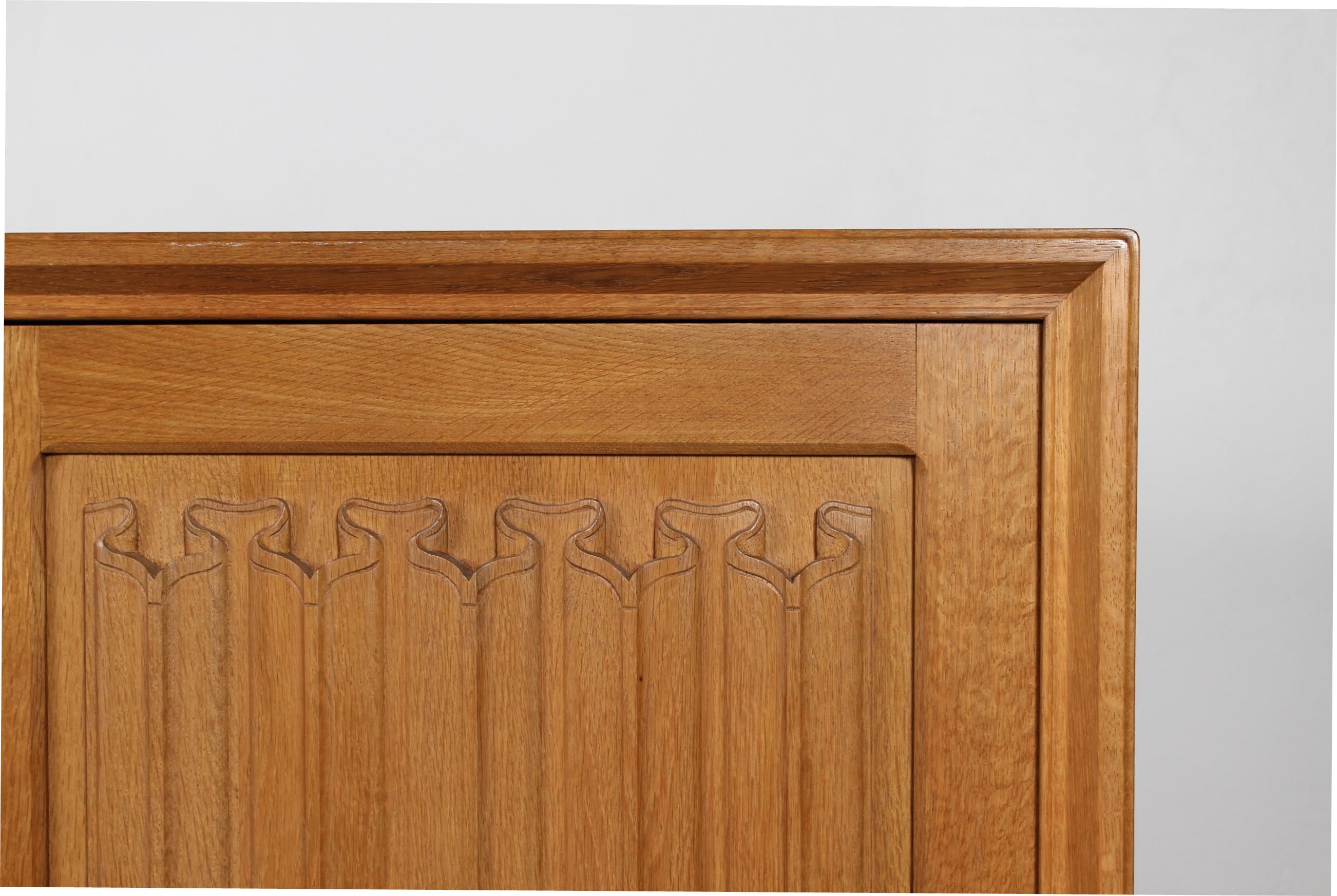 Danish Henning Kjærnulf style Long + High Sideboard of Solid carved Oak 1970s 4