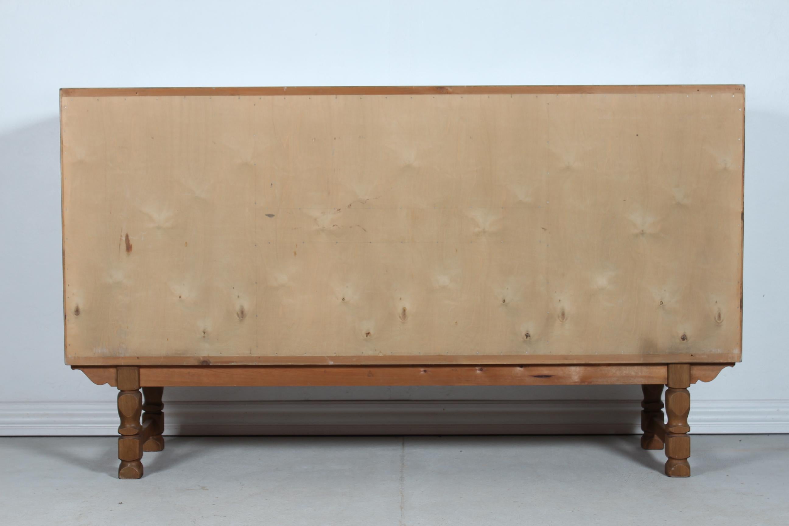 Danish Henning Kjærnulf style Long + High Sideboard of Solid carved Oak 1970s 7