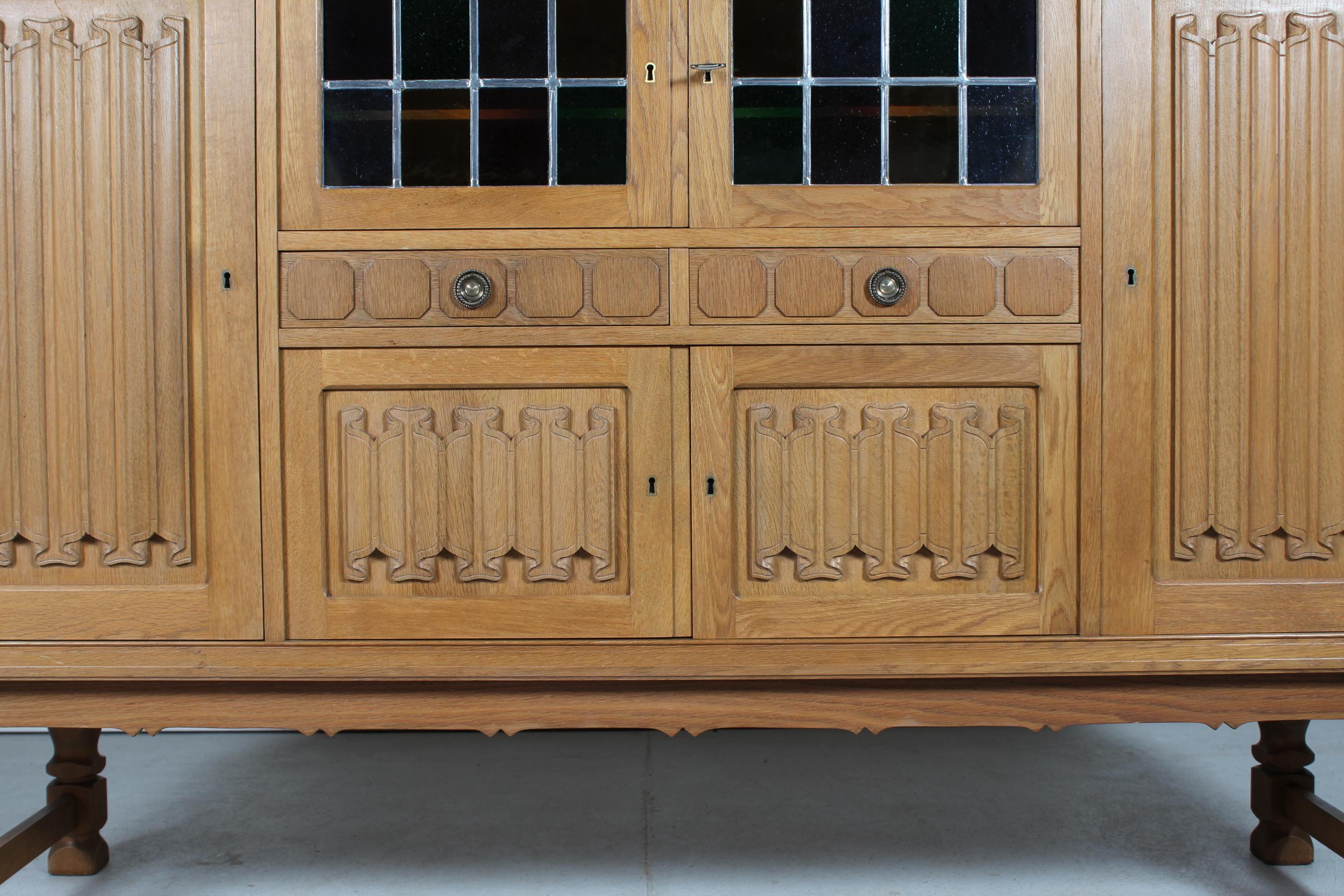 Late 20th Century Danish Henning Kjærnulf style Long + High Sideboard of Solid carved Oak 1970s