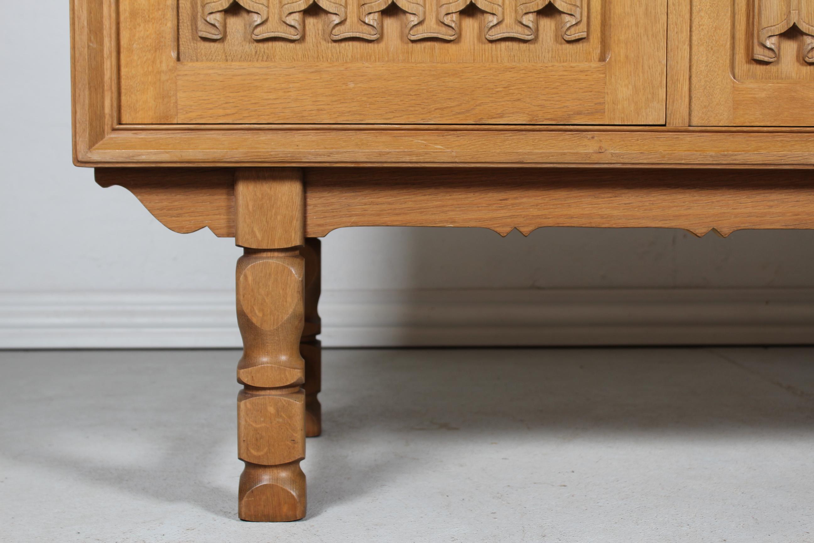 Danish Henning Kjærnulf style Long + High Sideboard of Solid carved Oak 1970s 1