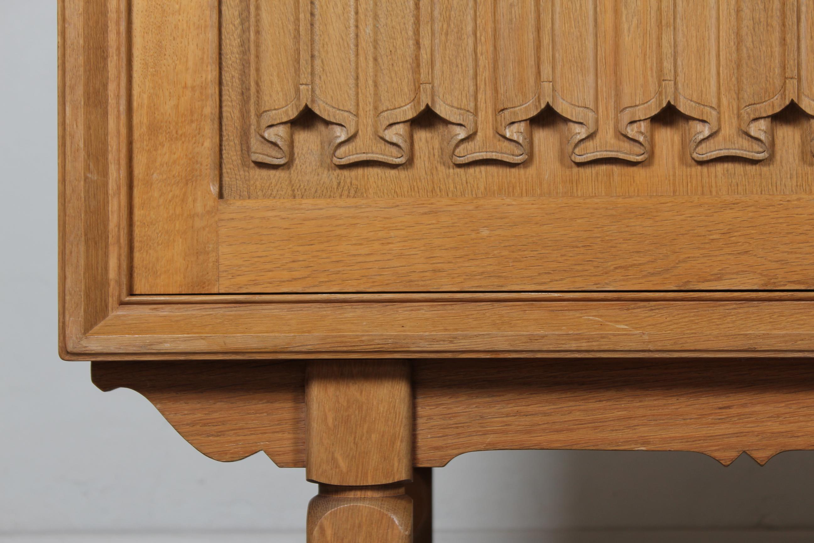 Danish Henning Kjærnulf style Long + High Sideboard of Solid carved Oak 1970s 2