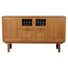 Danish Henning Kjærnulf style Long + High Sideboard of Solid carved Oak 1970s