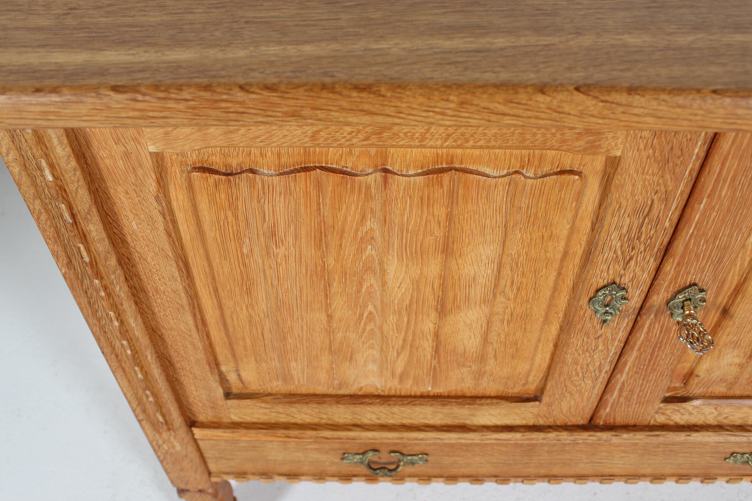 Danish Henning Kjærnulf style Long Sideboard of Oak with 4 Doors Brutalist 1970s For Sale 6