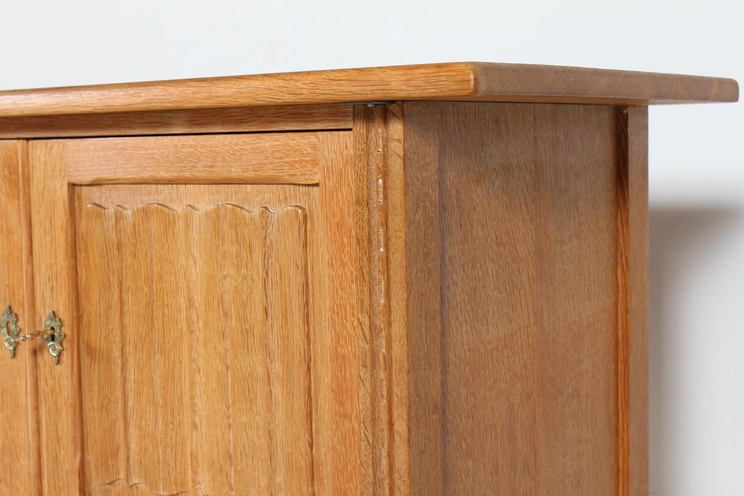 Danish Henning Kjærnulf style Long Sideboard of Oak with 4 Doors Brutalist 1970s For Sale 9
