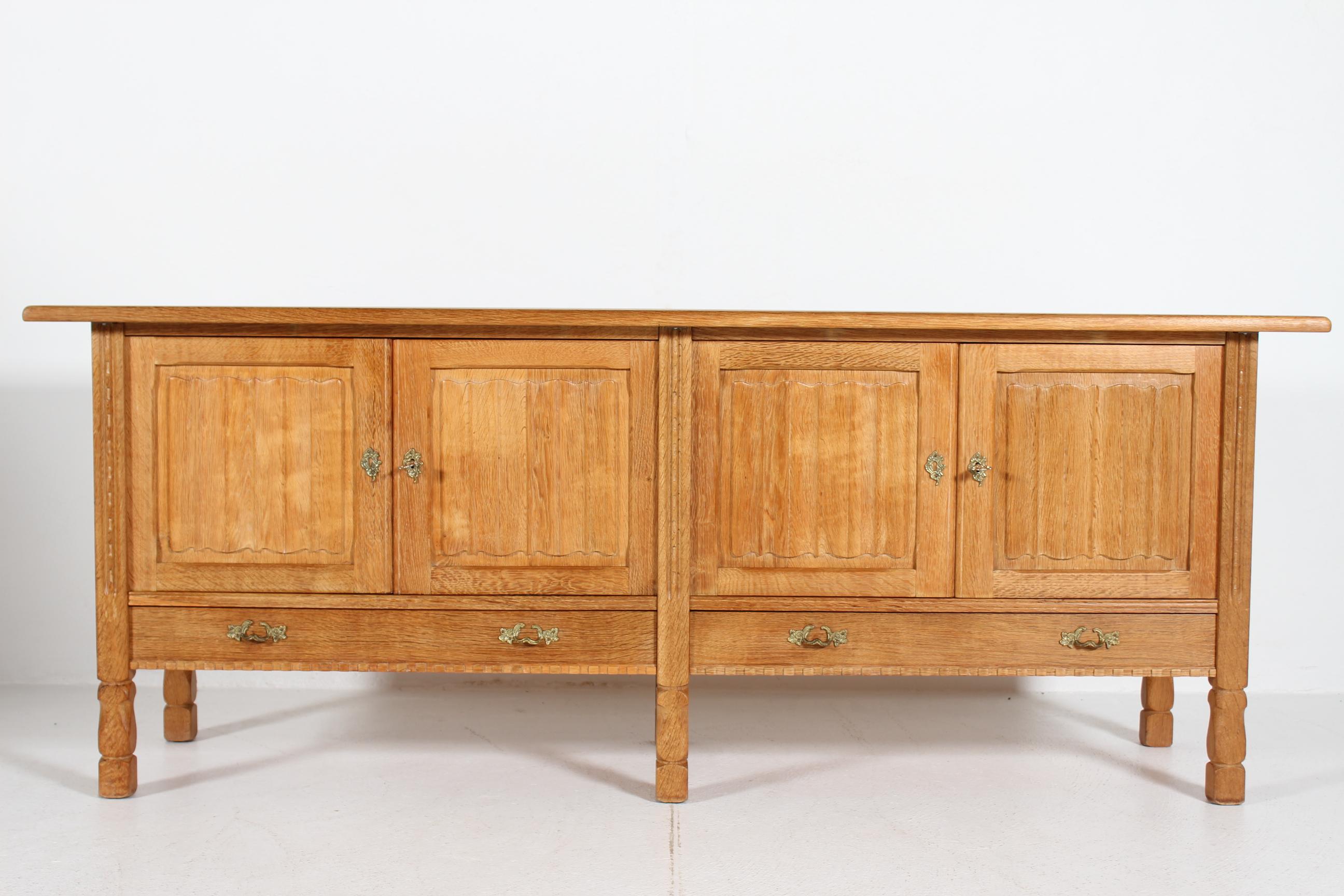 Danish Henning Kjærnulf style Long Sideboard of Oak with 4 Doors Brutalist 1970s In Good Condition For Sale In Silkeborg, Silkeborg