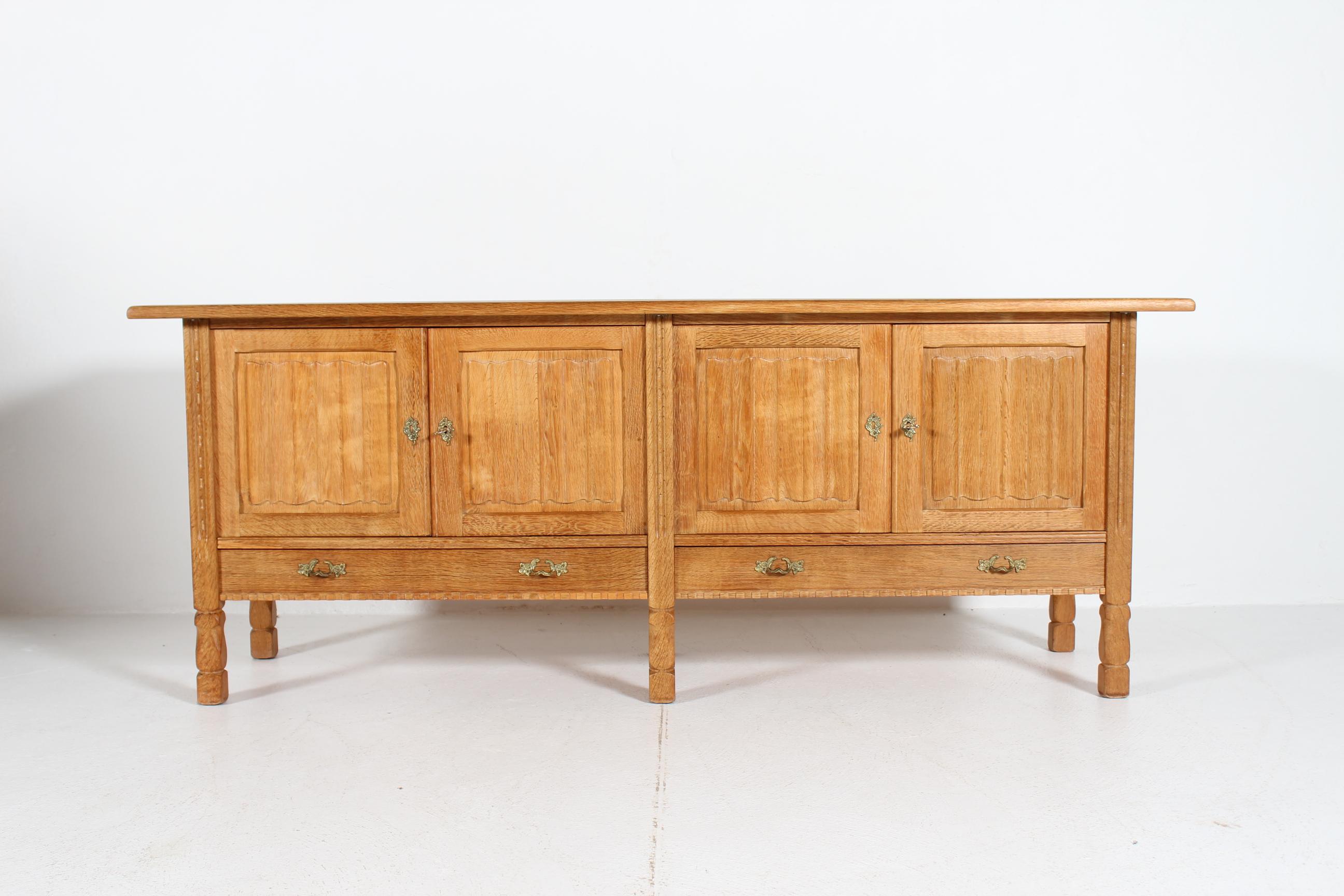 Late 20th Century Danish Henning Kjærnulf style Long Sideboard of Oak with 4 Doors Brutalist 1970s For Sale