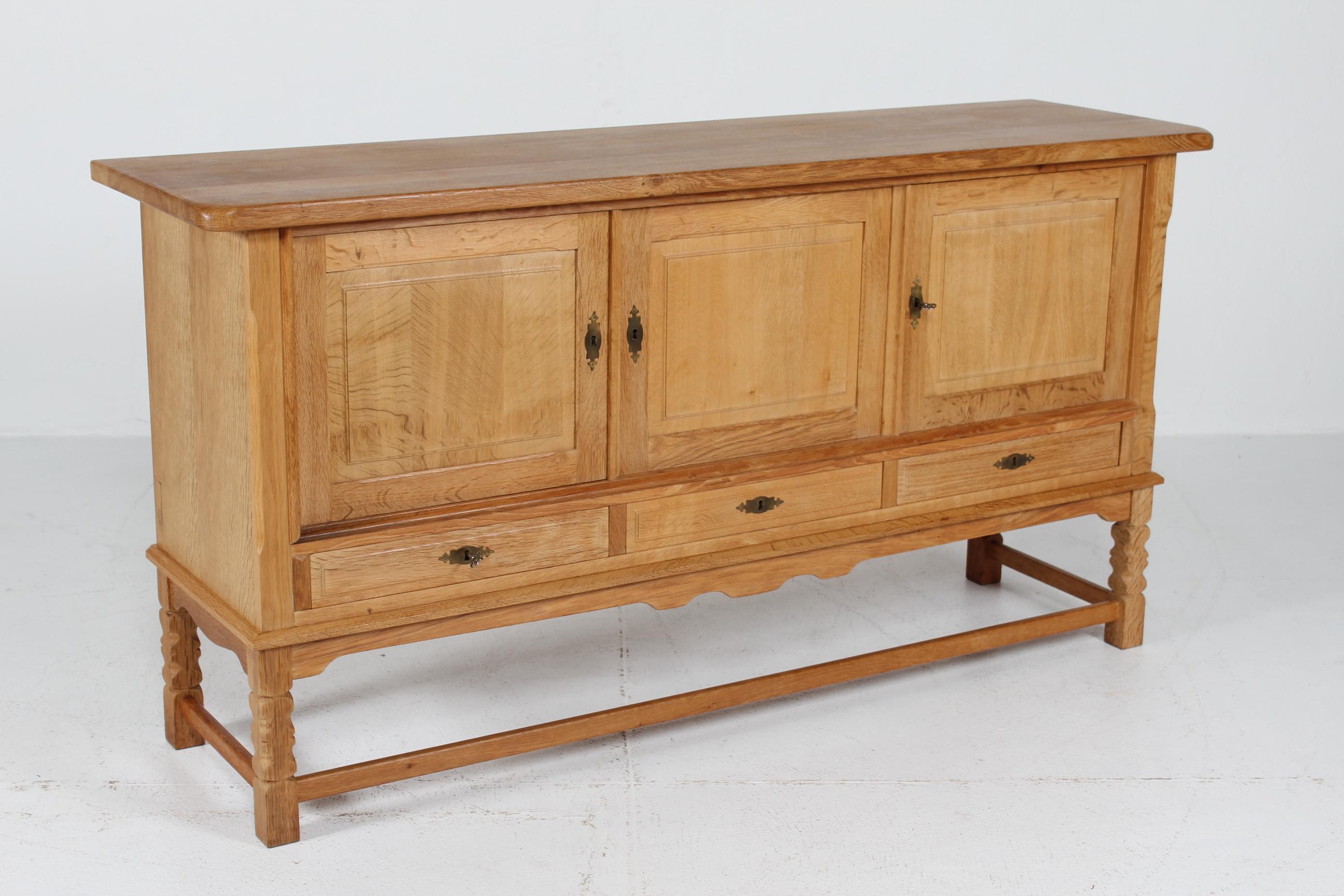 Mid-Century Modern Danish Henning Kjærnulf Style Long Sideboard of Solid Oak with 3 Doors 1970s