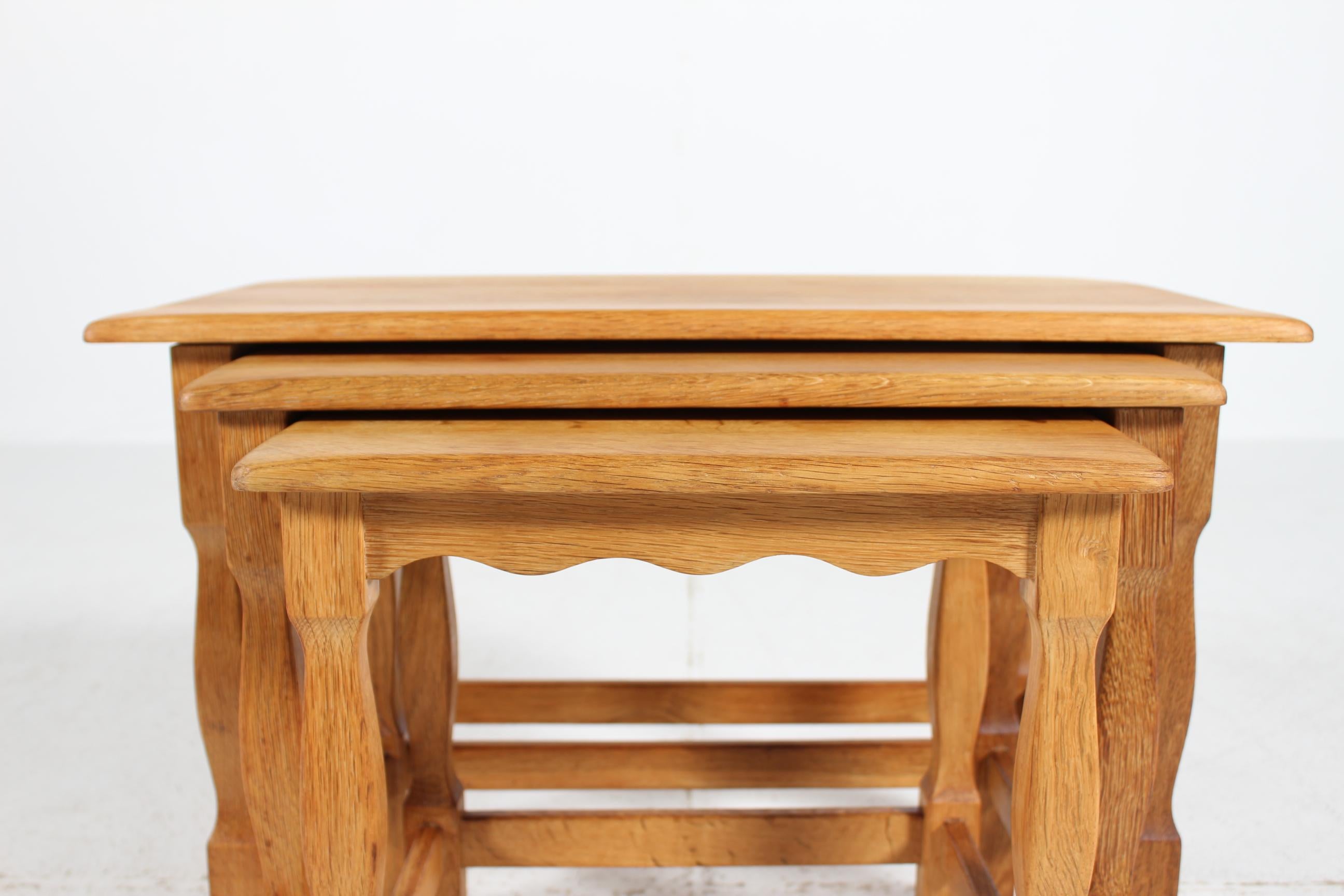 Late 20th Century Danish Henning Kjærnulf style Set of Nesting Tables of Solid Oak, 1970s For Sale