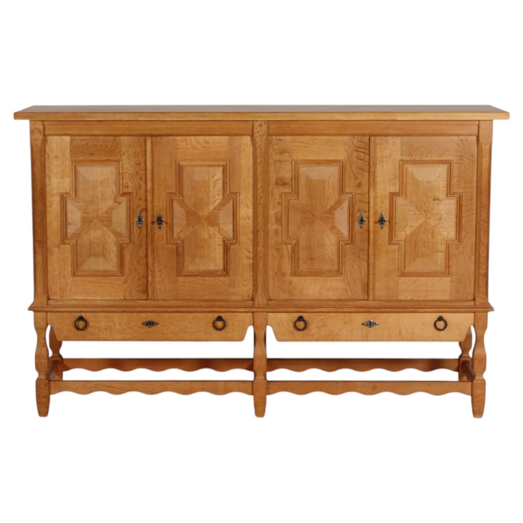 Danish Henning Kjærnulf Tall Sideboard of Oak with 4 Doors Brutalist Style 1970s