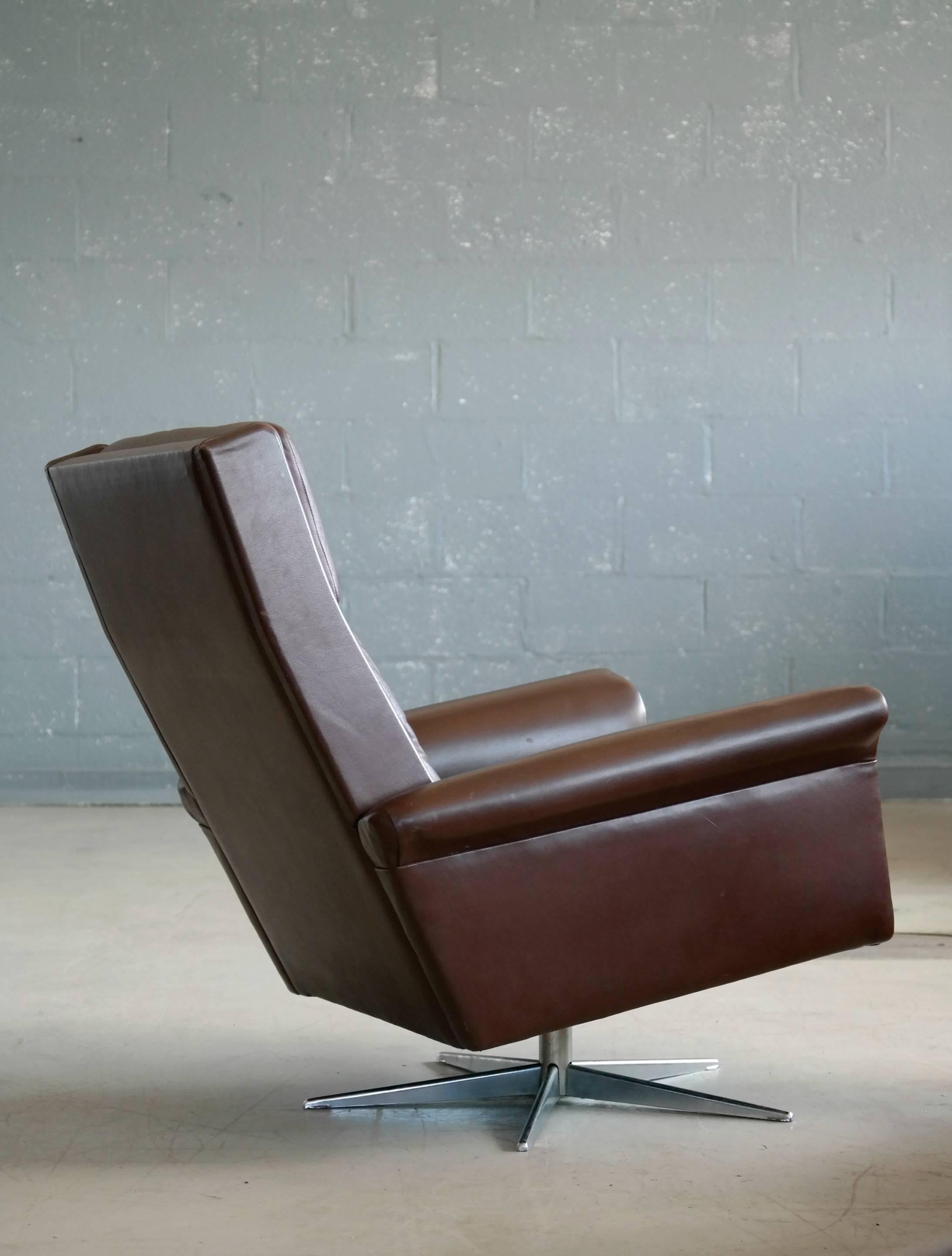 Scandinavian Modern Danish High Back Swivel Lounge Chair in Chocolate Leather by Georg Thams