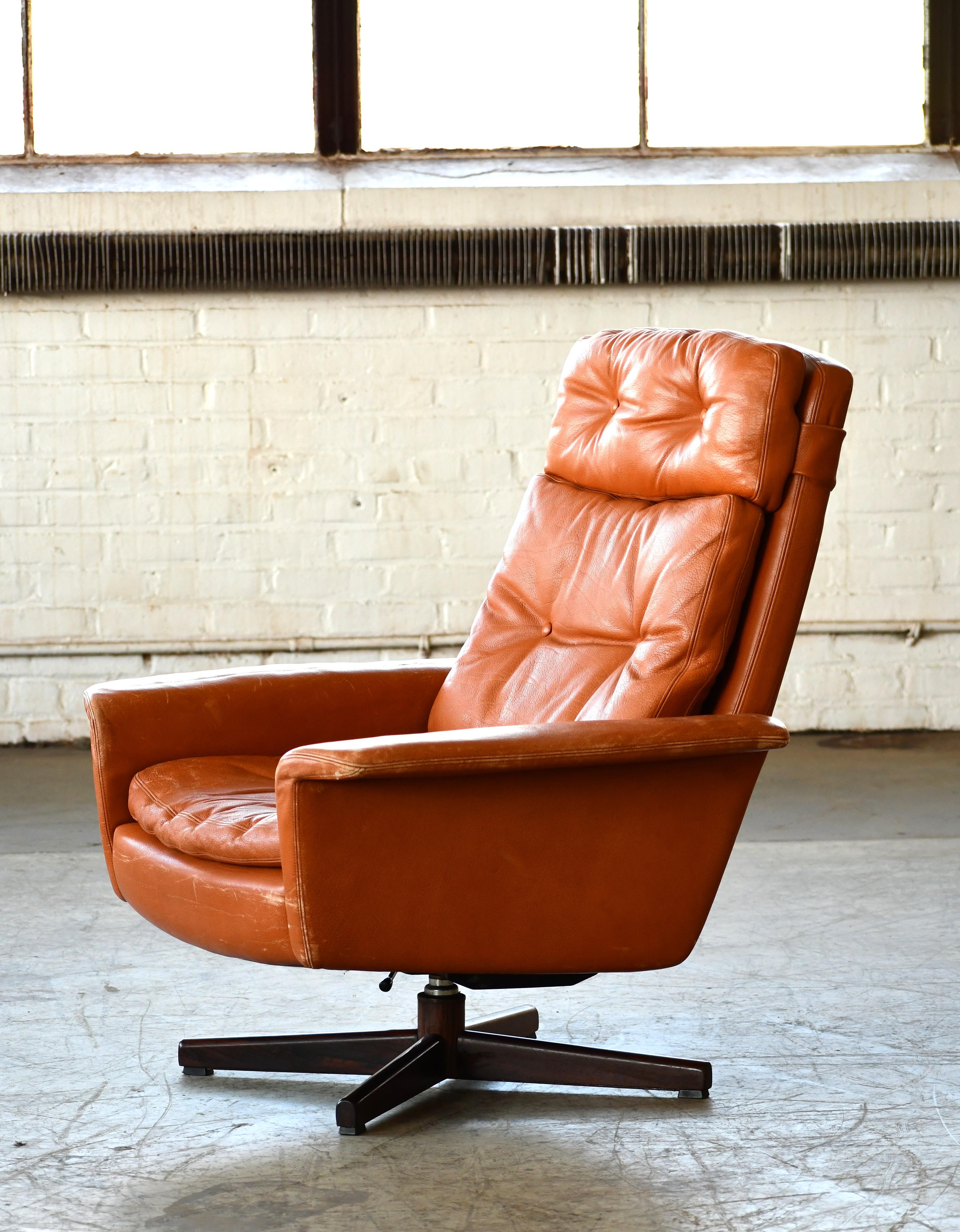 Danish High Back Swivel Lounge Chair with Ottoman in Cognac Leather, 1970's For Sale 1