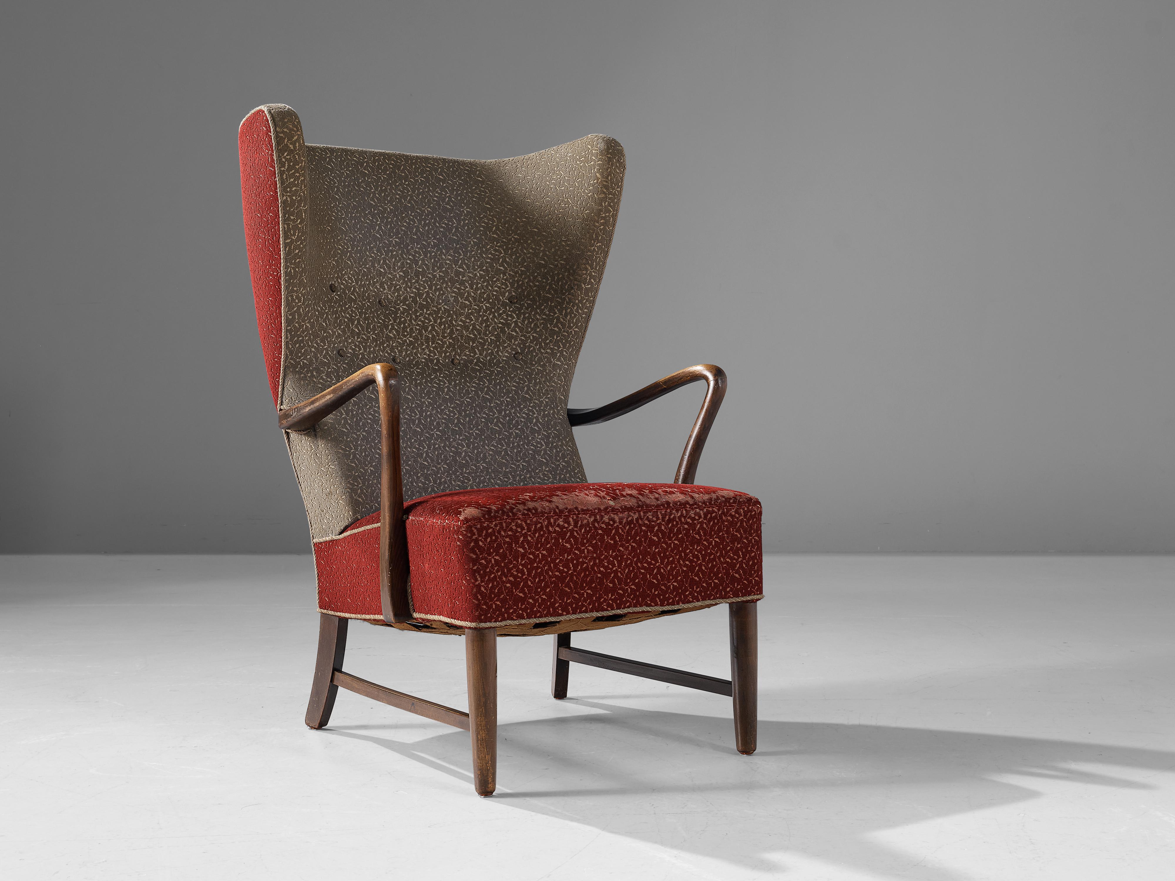 Easy chair, beech, fabric, Denmark, 1950s

Beautiful, organic armchair designed made in Denmark. This striking example of Scandinavian Modern design of the 1950s shows a grand curved, wingback backrest with tufted buttons. The ergonomically shaped