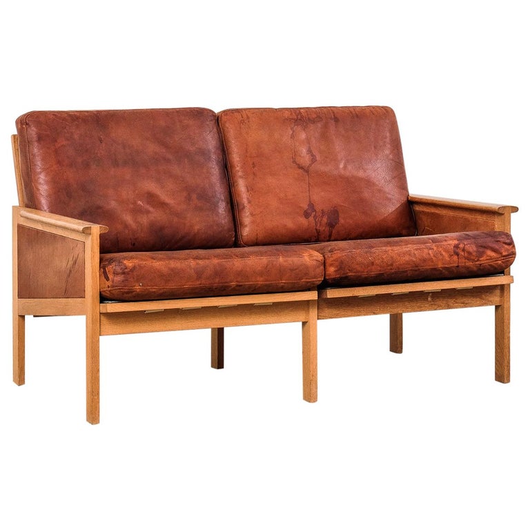 Danish Illum Wikkelsø Two-Seat 'Capella' Sofa in Patinated Leather and Oak,  1960 at 1stDibs