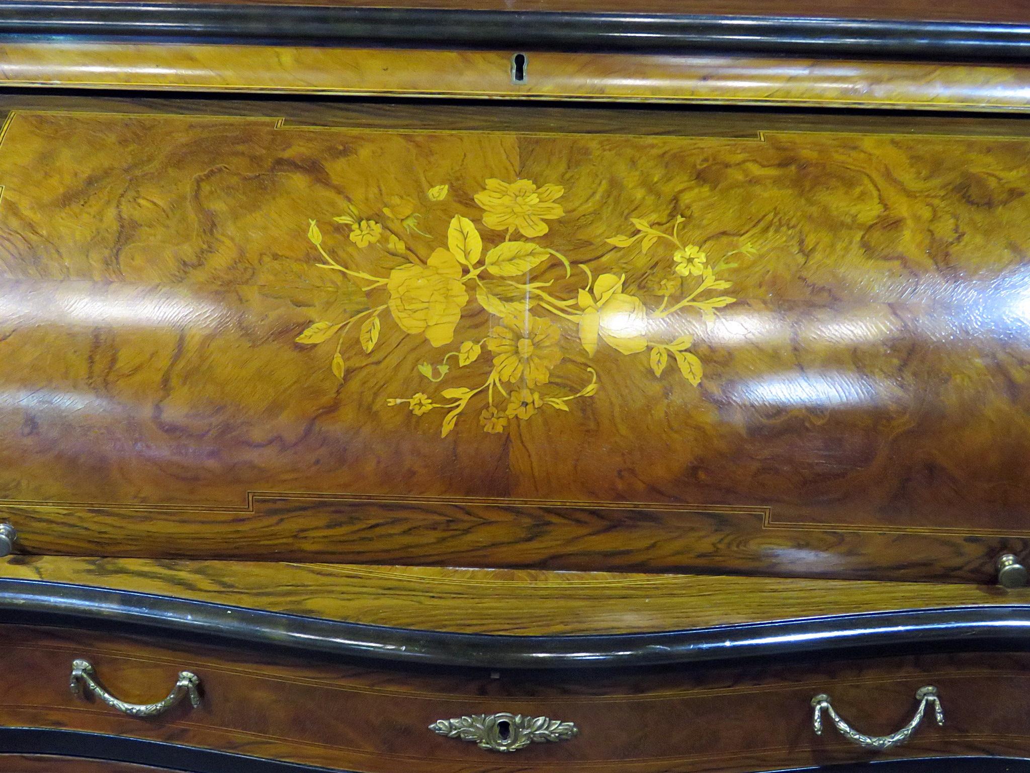 French-made (Danish retailed) inlaid cylinder desk with 4 drawers and storage on top over 4 drawers with brass accents. Incredible workmanship. This is not a Danish desk, just as Macy's sells Italian furniture, that doesn't make it American. The