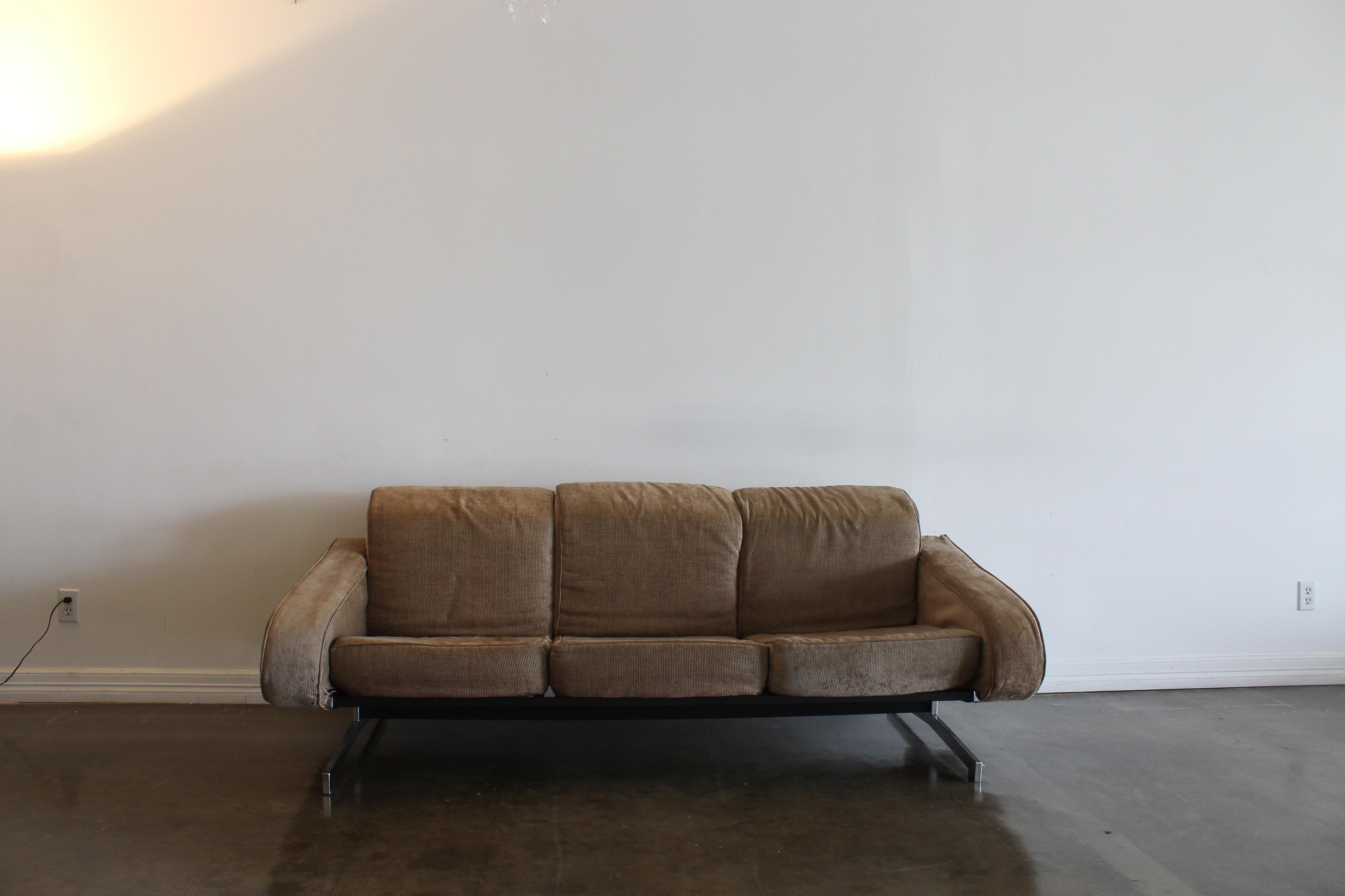 Cool 70s style sofa in a tan corduroy fabric. Also has a matching lounge chair!