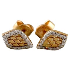 Danish Jeweler, a Pair of Ear Studs in 14 Carat Gold Adorned with Diamonds