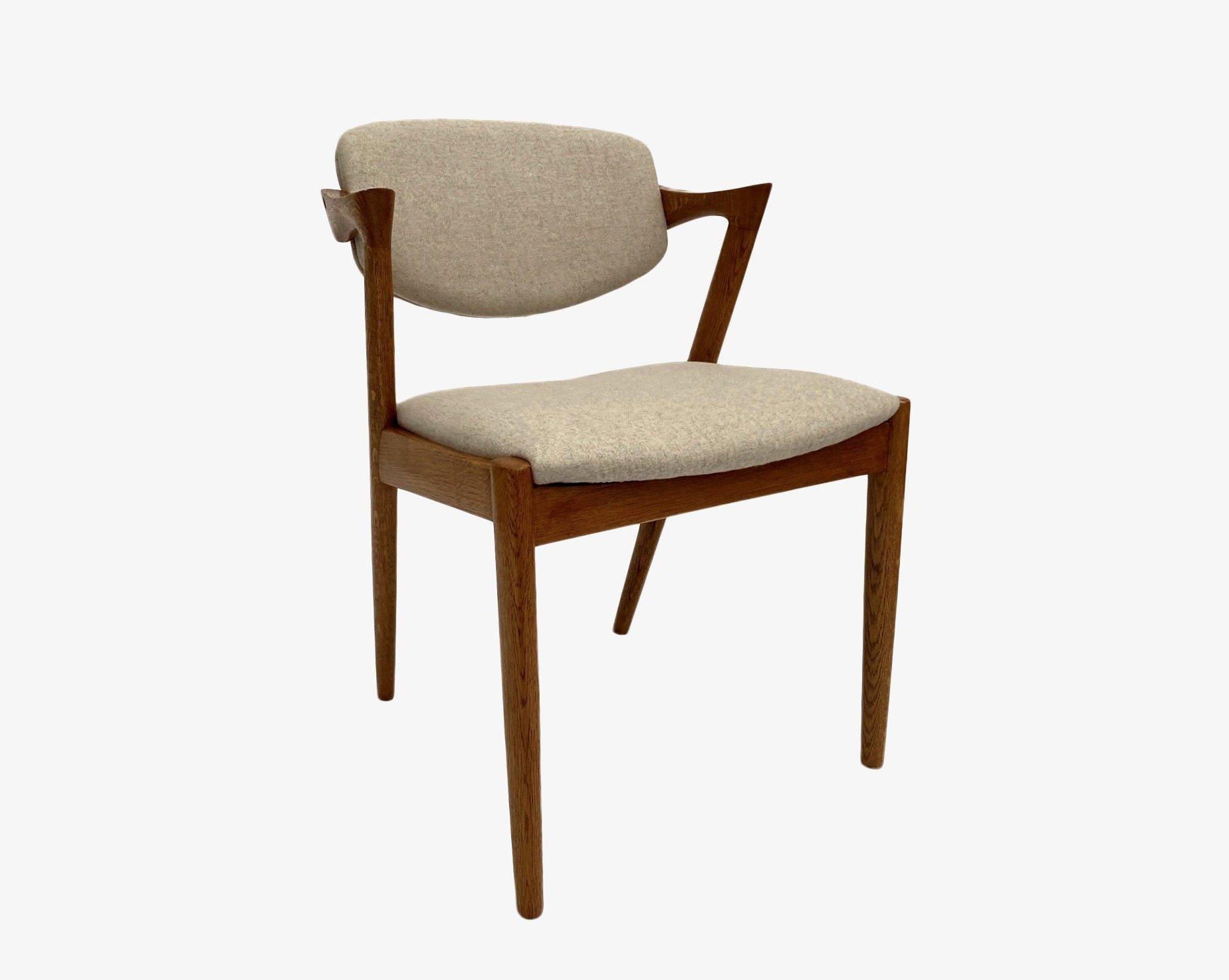 Mid-Century Modern Danish Kai Kristiansen Set of 4 Model 42 Oak and Cream Wool Dining Chairs
