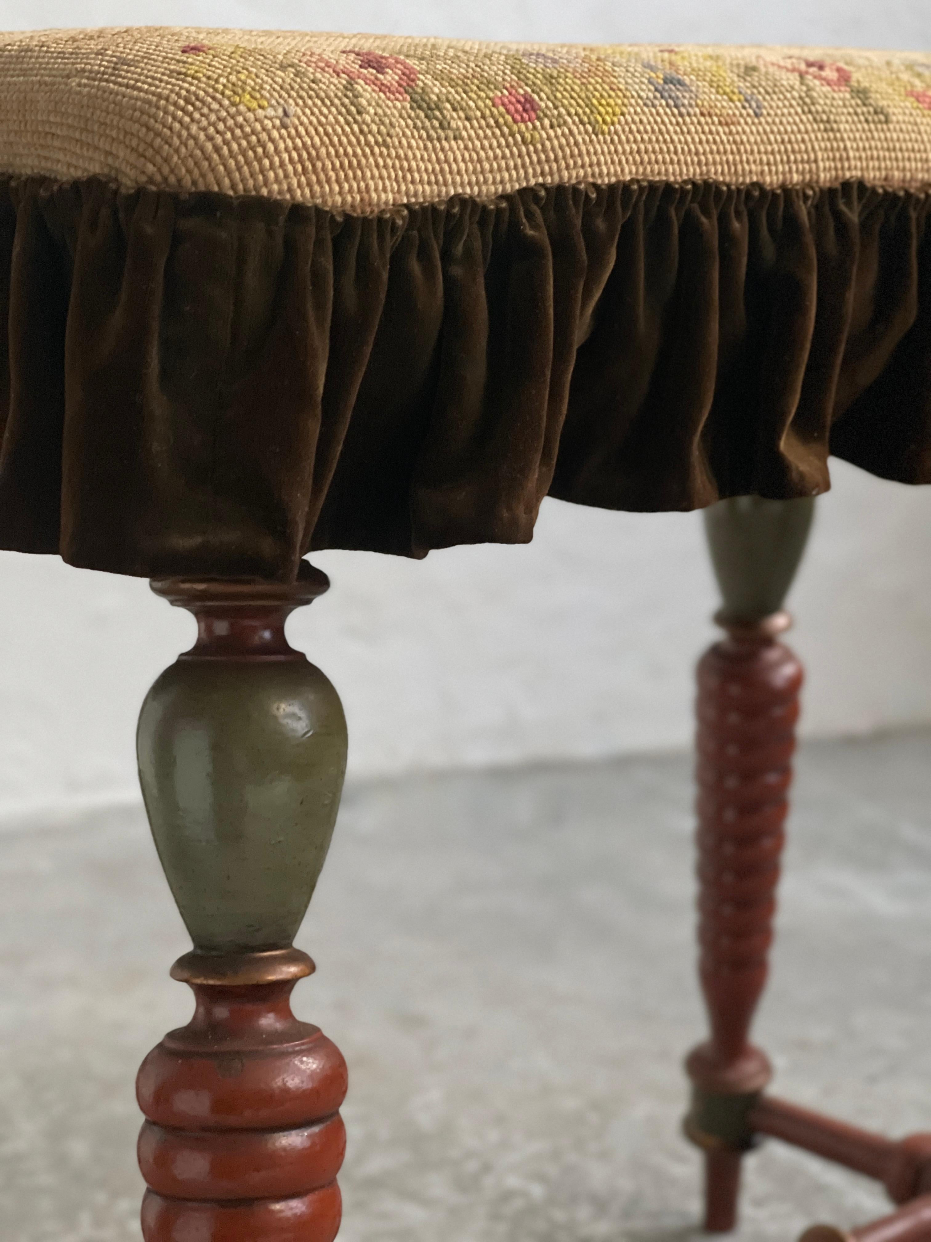 Late 19th Century Danish Late 19th century Stool with carved painted legs and embroidered seat. For Sale