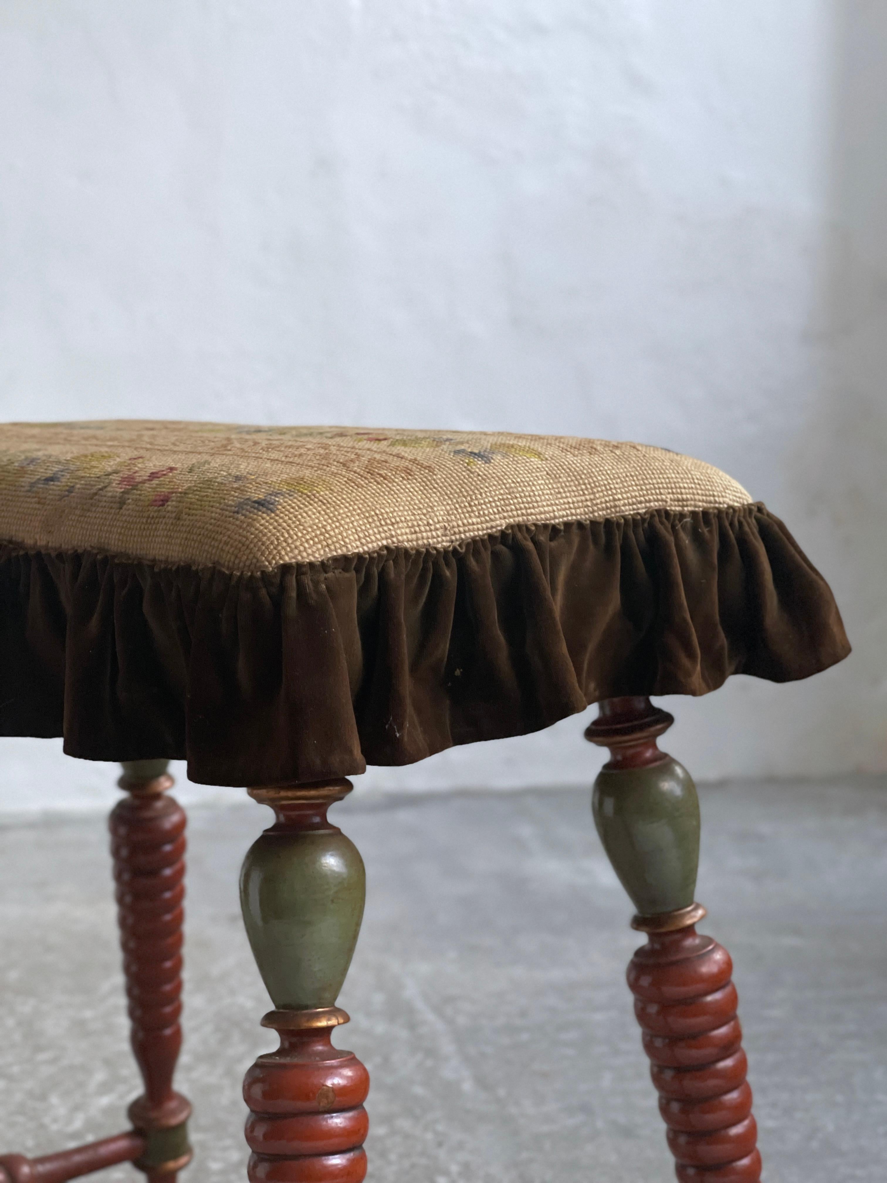 Danish Late 19th century Stool with carved painted legs and embroidered seat. 1
