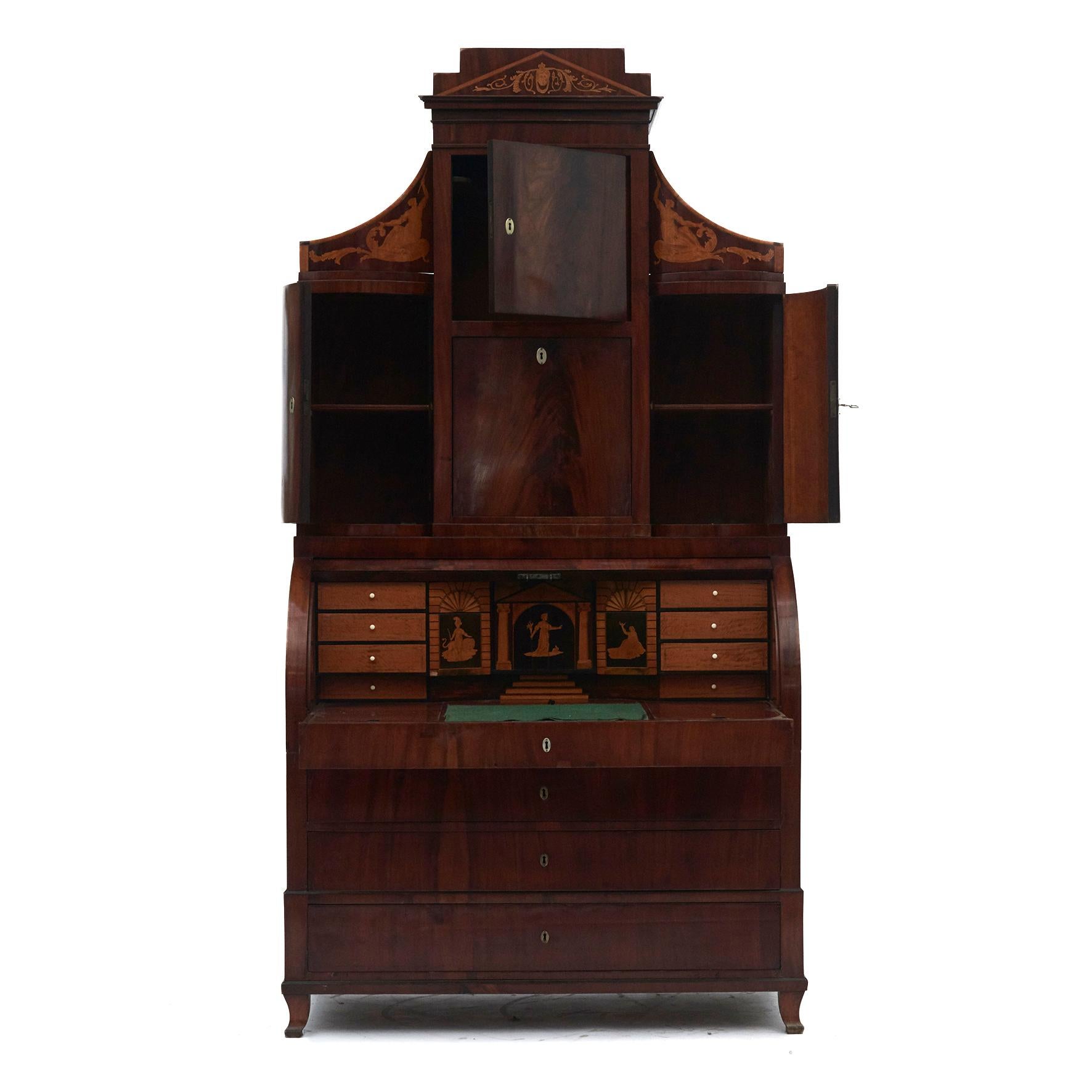Rare Danish early 19th century secretary or slant front bureau.
Exquisitely crafted from mahogany with fabulous marquetry decoration in black nobel wood, satinwood and walnut.
A true example of beautiful, rare and refined design and excellent