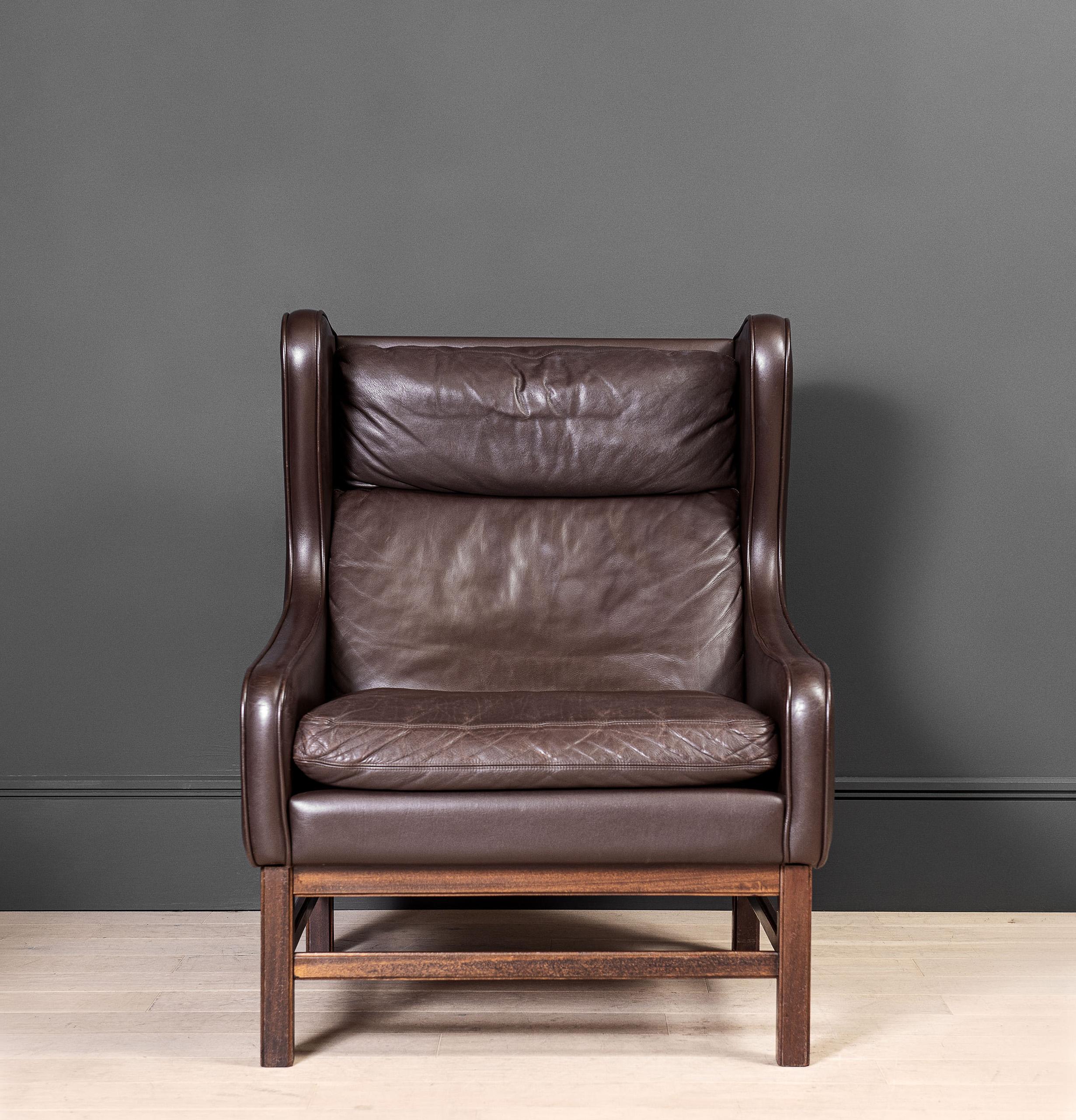 Sofa is available to purchase separately if preferred. 
A matching 3 seater dark brown leather wing-back sofa and lounge chair. Produced in Denmark during the 1960s. Borge Mogensen in style - these are substantial pieces and rather unusual in their