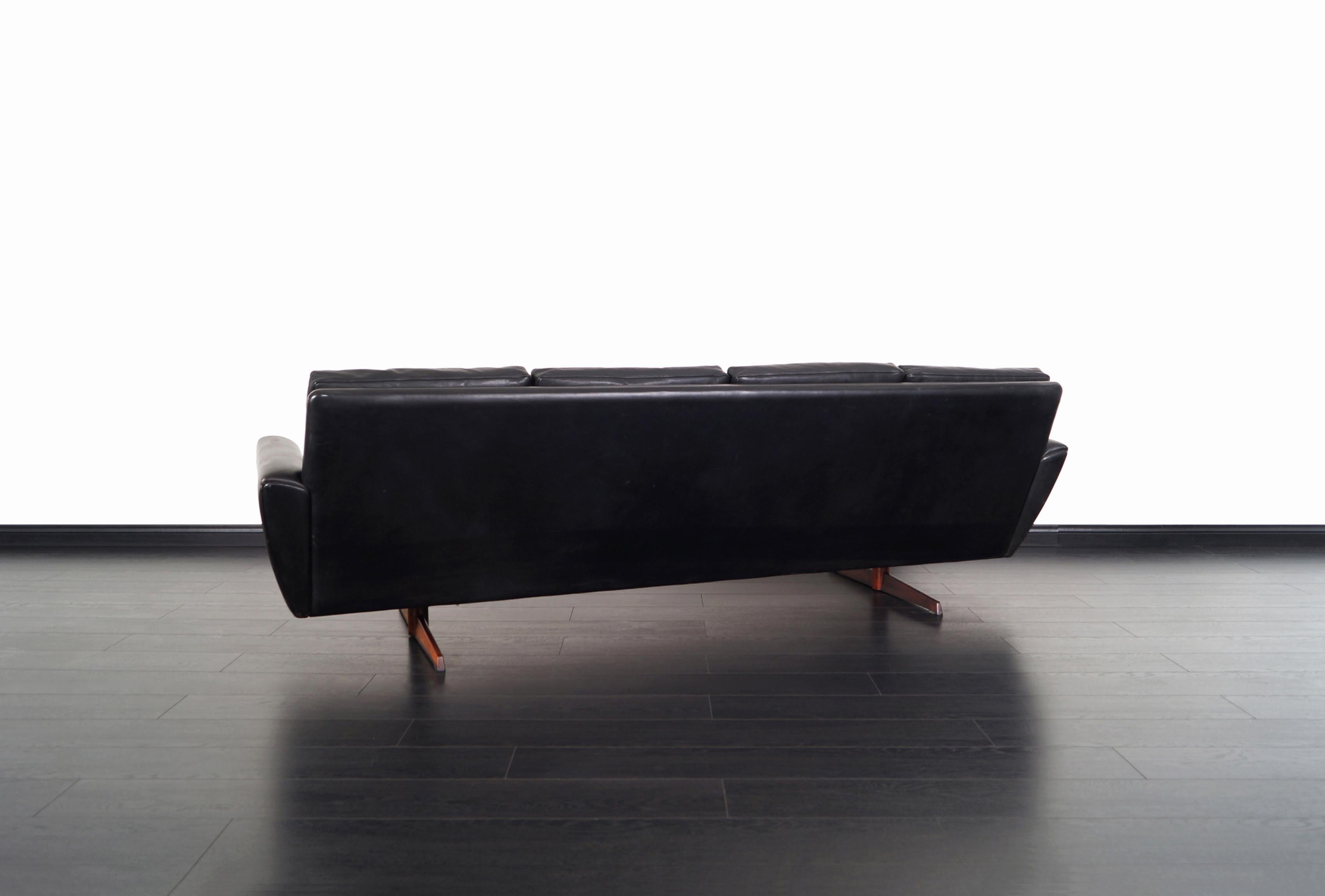 Late 20th Century Danish Leather and Rosewood Wingback Sofa by Georg Thams