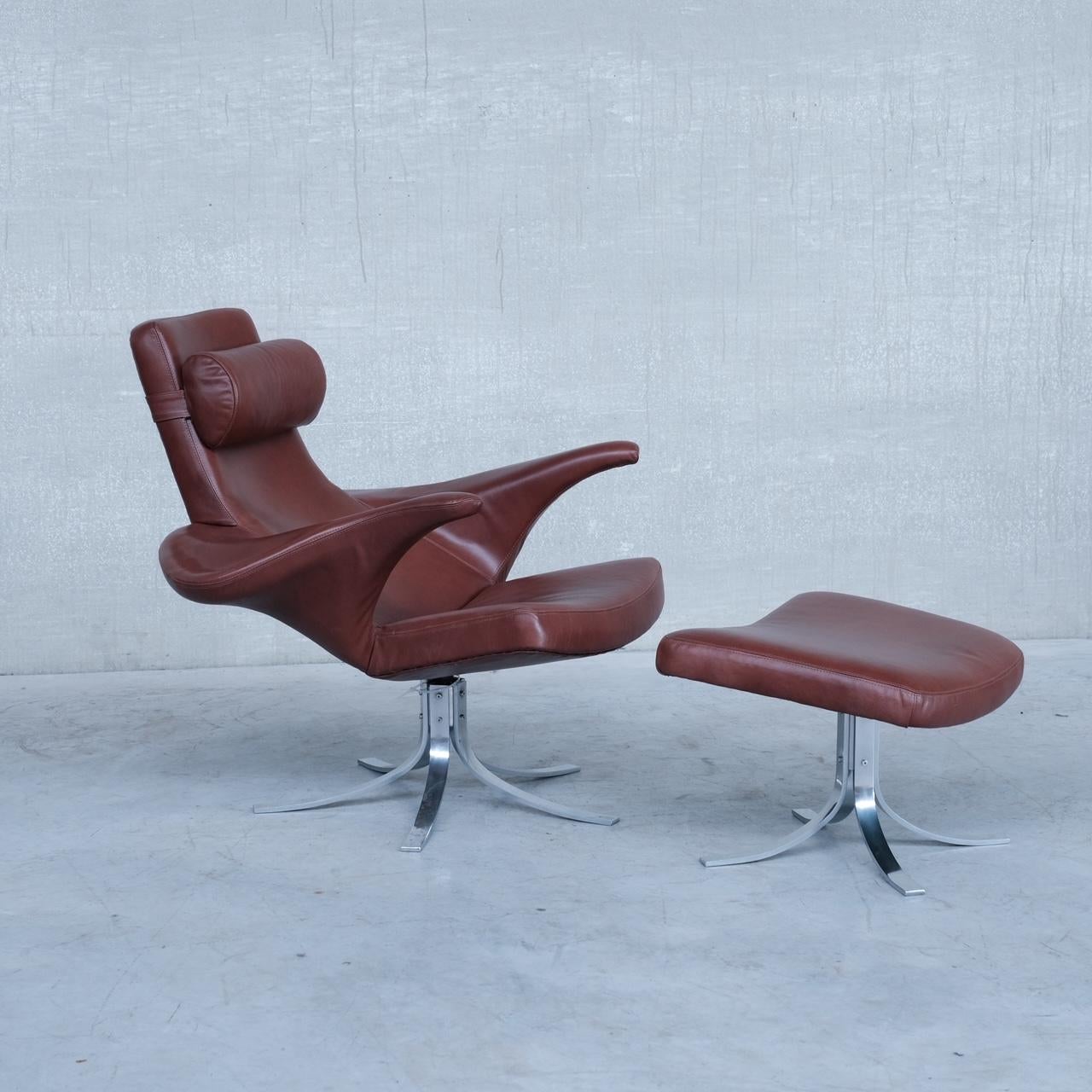 A very scarce armchair by Gösta Berg and Stenerik Eriksson for Fritz Hansen. 

Denmark, c1960s. 

Model: 9601 Måsen / Seagull. 

Only produced between 1968-73

A rotating armchair, matching footstool and optional head rest. 

Re-covered in