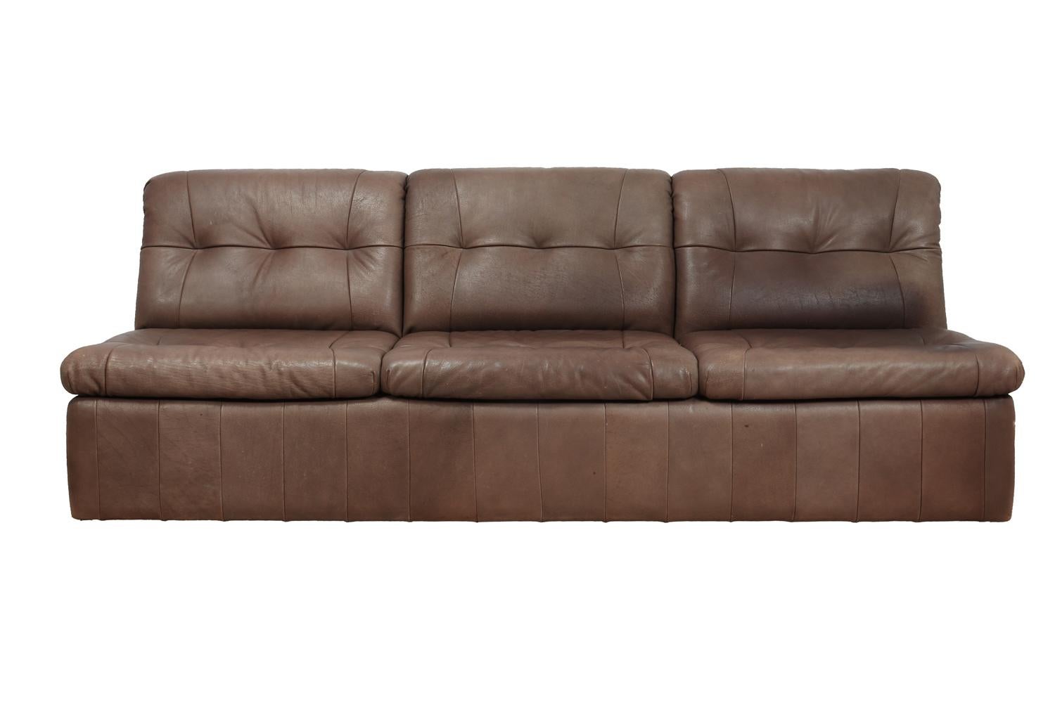 Danish leather modular suite three-seat, two-seat, one circa 1960
A Danish leather suite comprising of a three seat sofa, a two-seat sofa and a single chair, these also come with four cushions , the suite has very minimal wear no damage or old