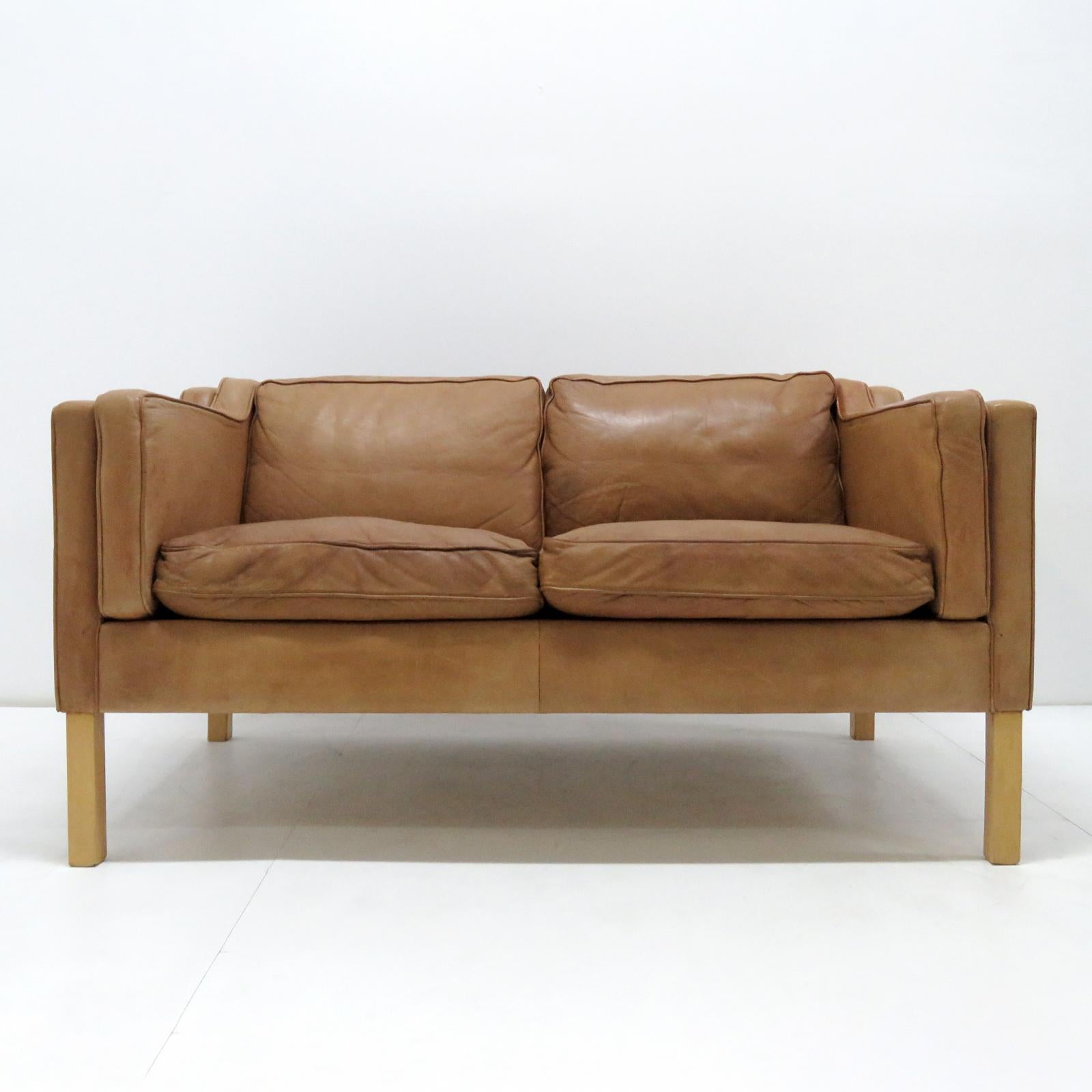 wonderful 1960s, Danish 2-seat sofa in style of Borge Mogensen, in cognac colored leather on beech frame.