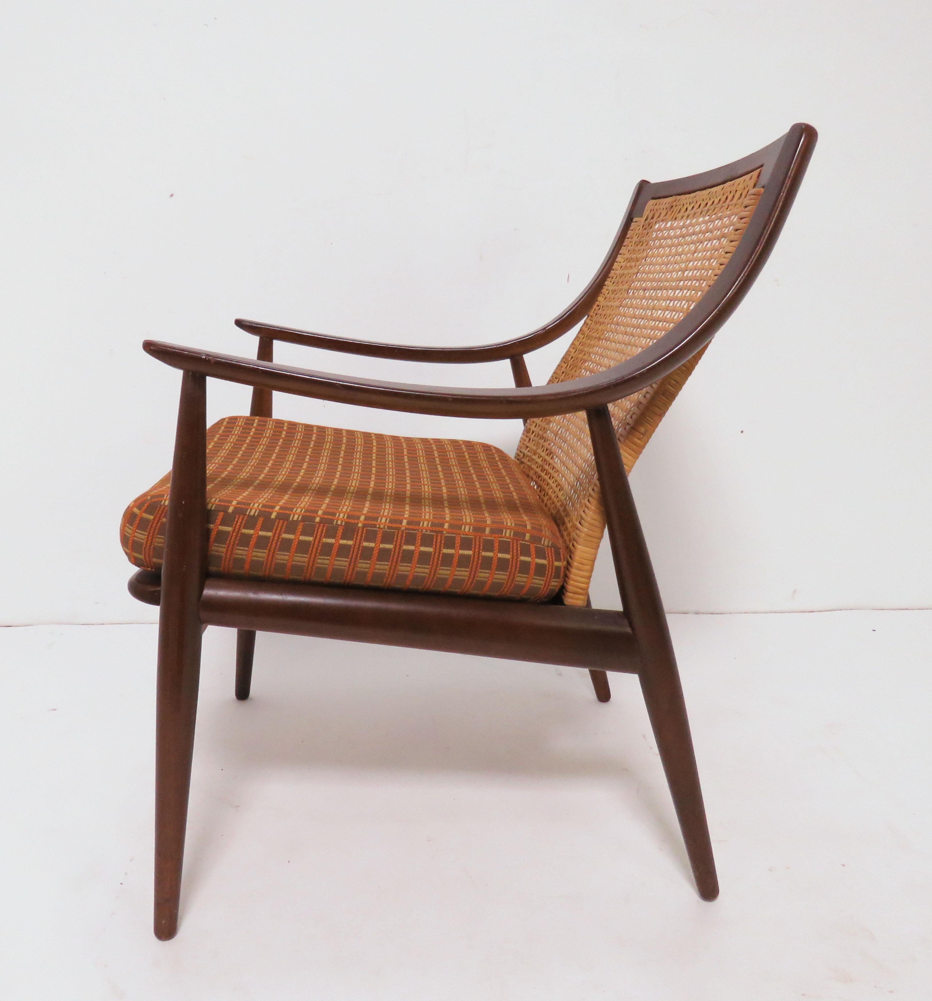 Iconic Model FD146 lounge chair with caned backrest by Peter Hvidt & Orla Mølgaard-Nielsen, ca. 1950s, for France & Daverkosen, Denmark.