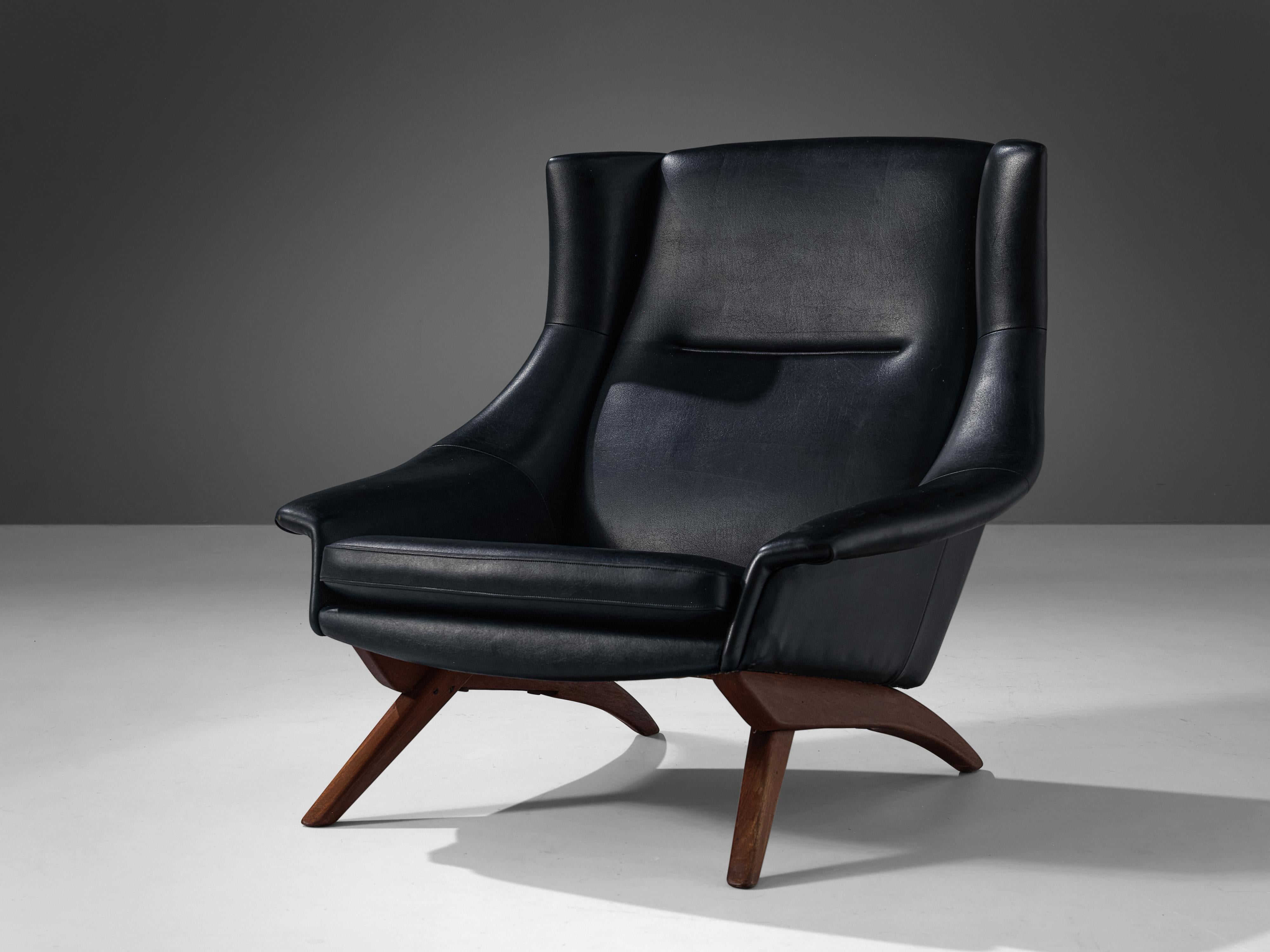 Lounge chair, teak, leather, Denmark, 1960s.

This lounge chair was designed in Denmark and shows great similarities with the designs of Illum Wikkelsø. This armchair is comfortable and shows playful details. The chair bends slightly backwards in