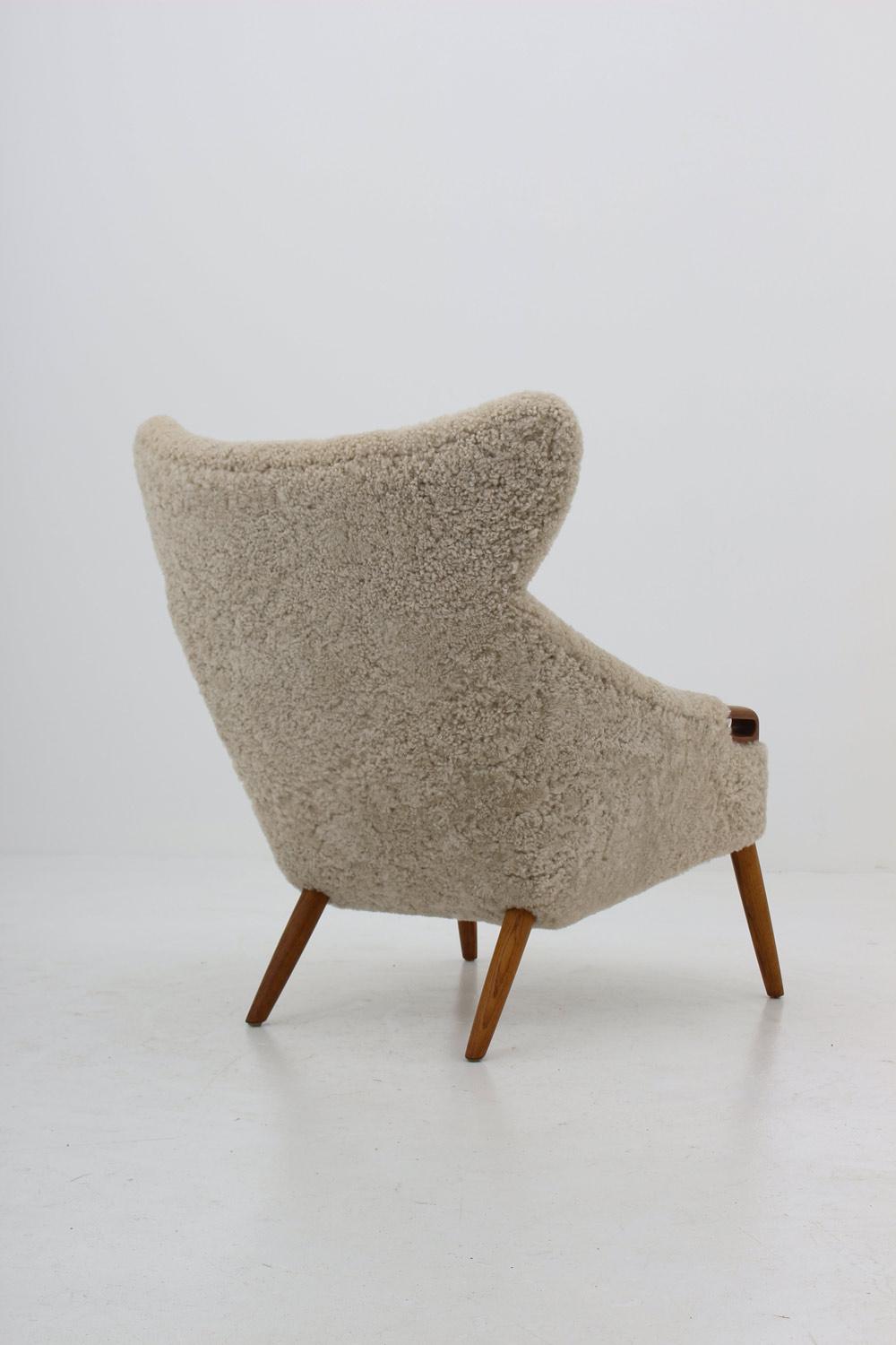 Scandinavian Modern Danish Lounge Chair in Sheepskin, Model 55 by Kurt Østervig